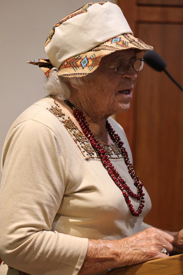 Ms. Mollie Jacobs opens Honoring Native Foodways with prayer