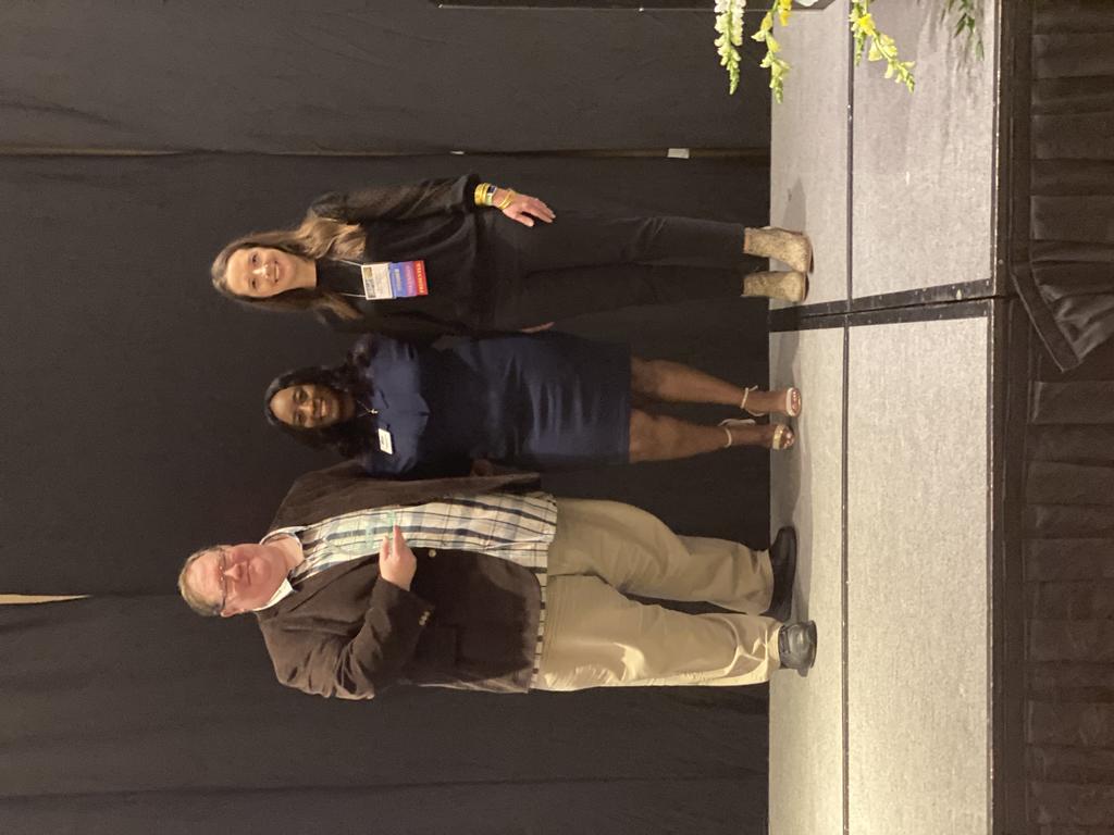 Dr. Jonathan Ricks (far right) was presented with the Counselor Educator of the Year award at the Fall 2022 Conference of the North Carolina School Counselor Association