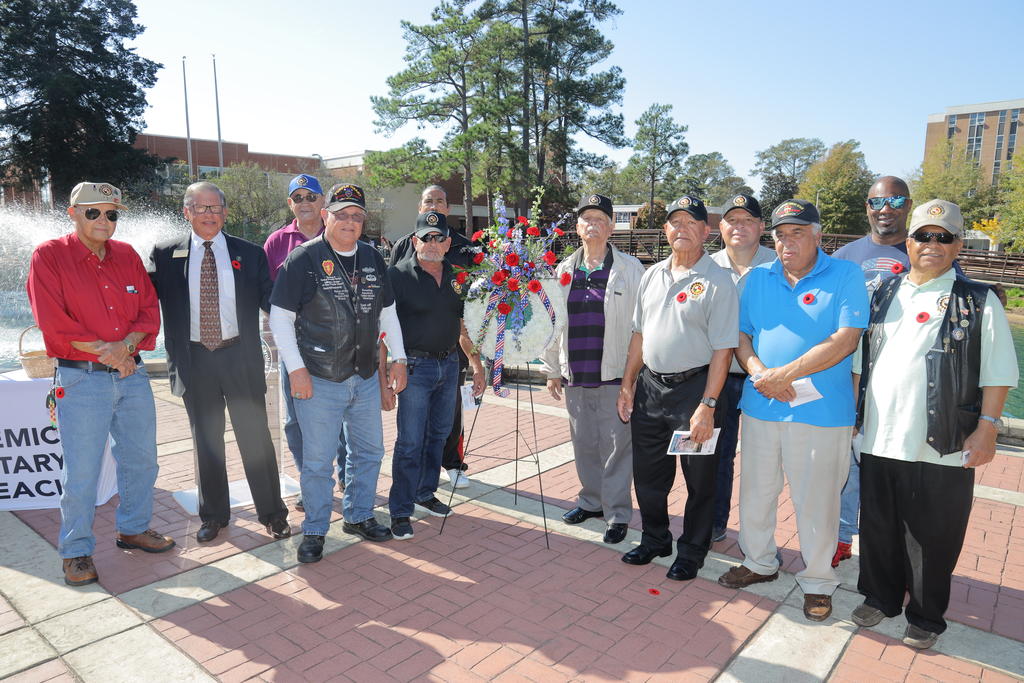 Chancellor Robin Gary Cummings (second from left) with a group of veterans from the community