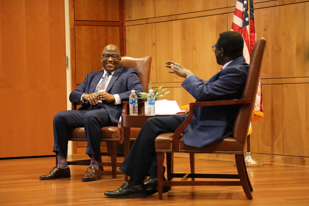 Dr. Cliff Mensah (right) conducts a fireside chat with Brigadier General Allen Jamerson (Ret.) as part of the Distinguished Speaker Series on Feb. 21