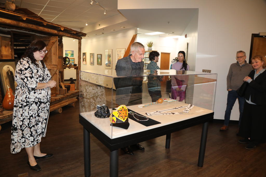 Rick West tours the Museum of the Southeast American Indian during a campus visit on February 22