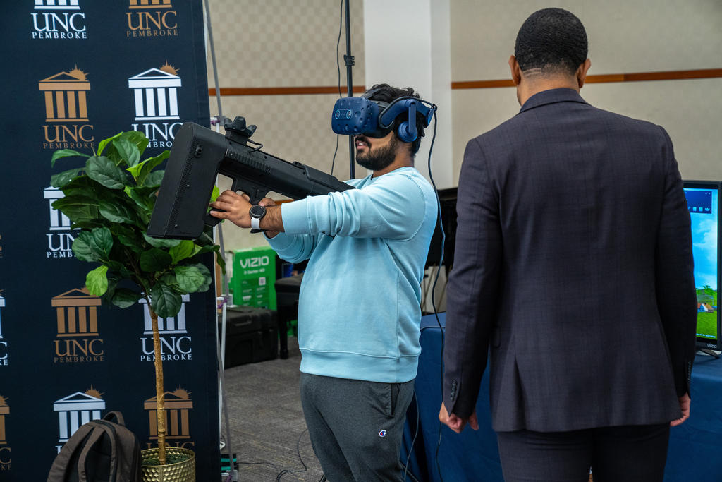 UNCP junior Harry Lamichhane tests a DS Drone Defender during the U.S. Department of State career showcase on February 26