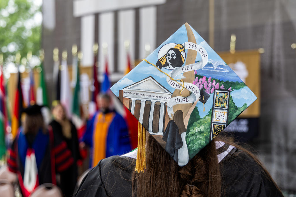 Graduates, like Aspen Andersson, unleashed their mortar board creativity at Spring Commencement at UNCP
