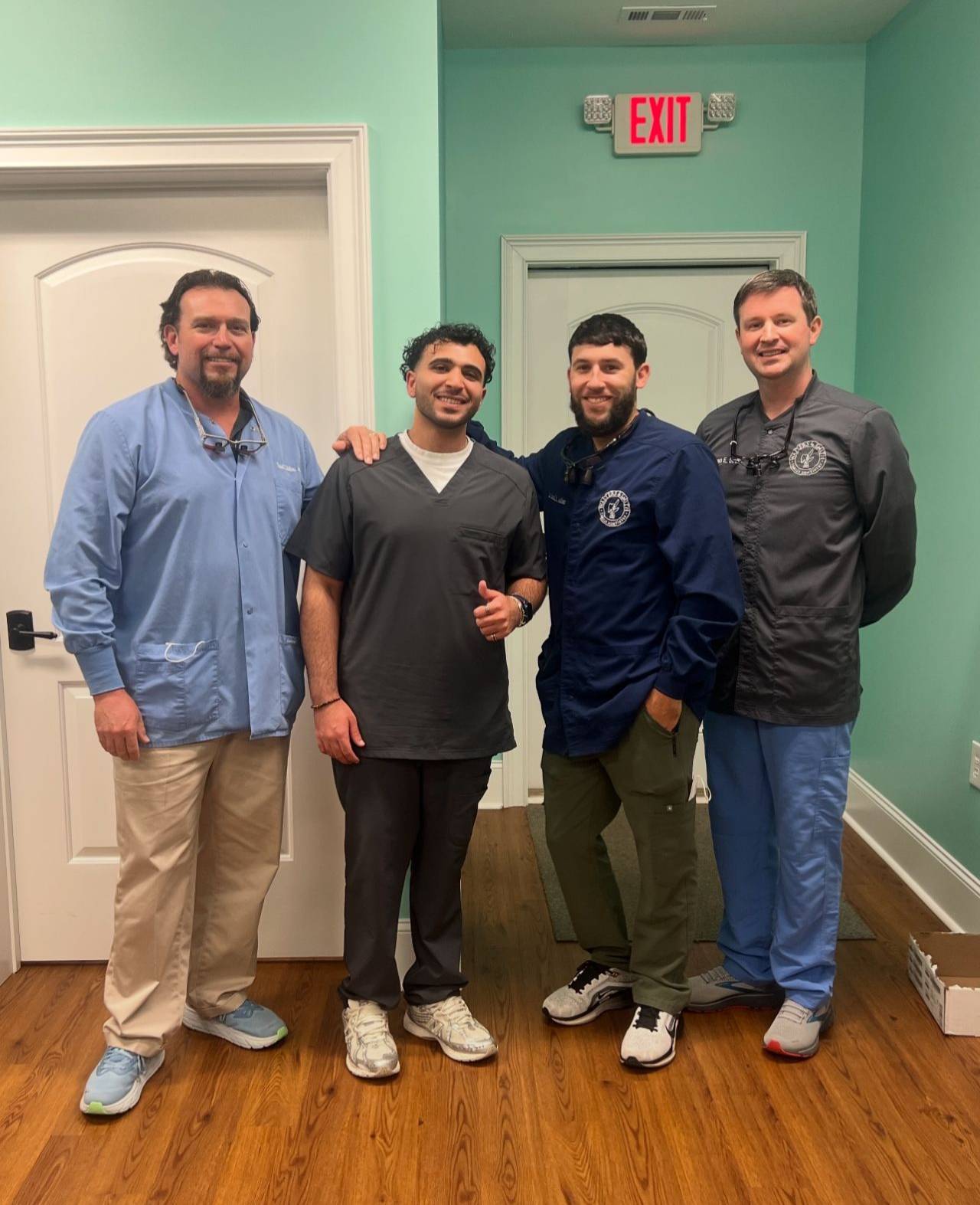 Auley with the dentist he worked with