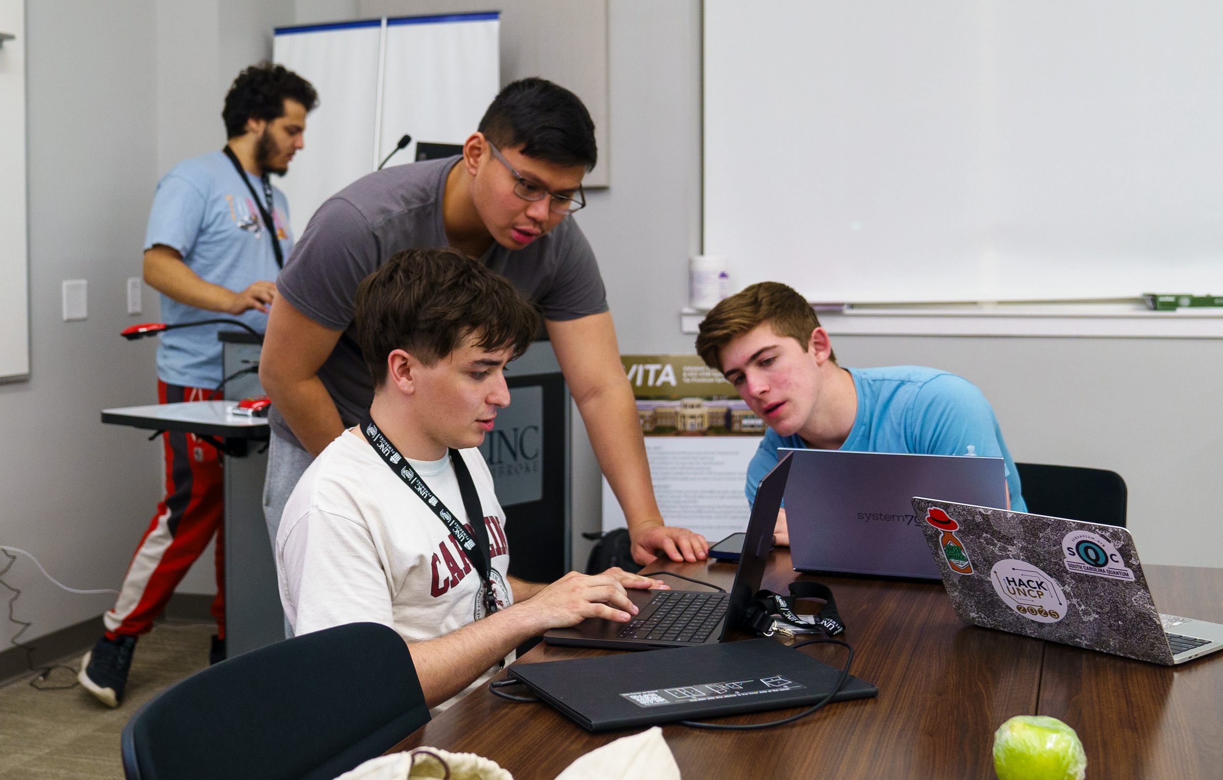hackathon UNC Pembroke students on laptops