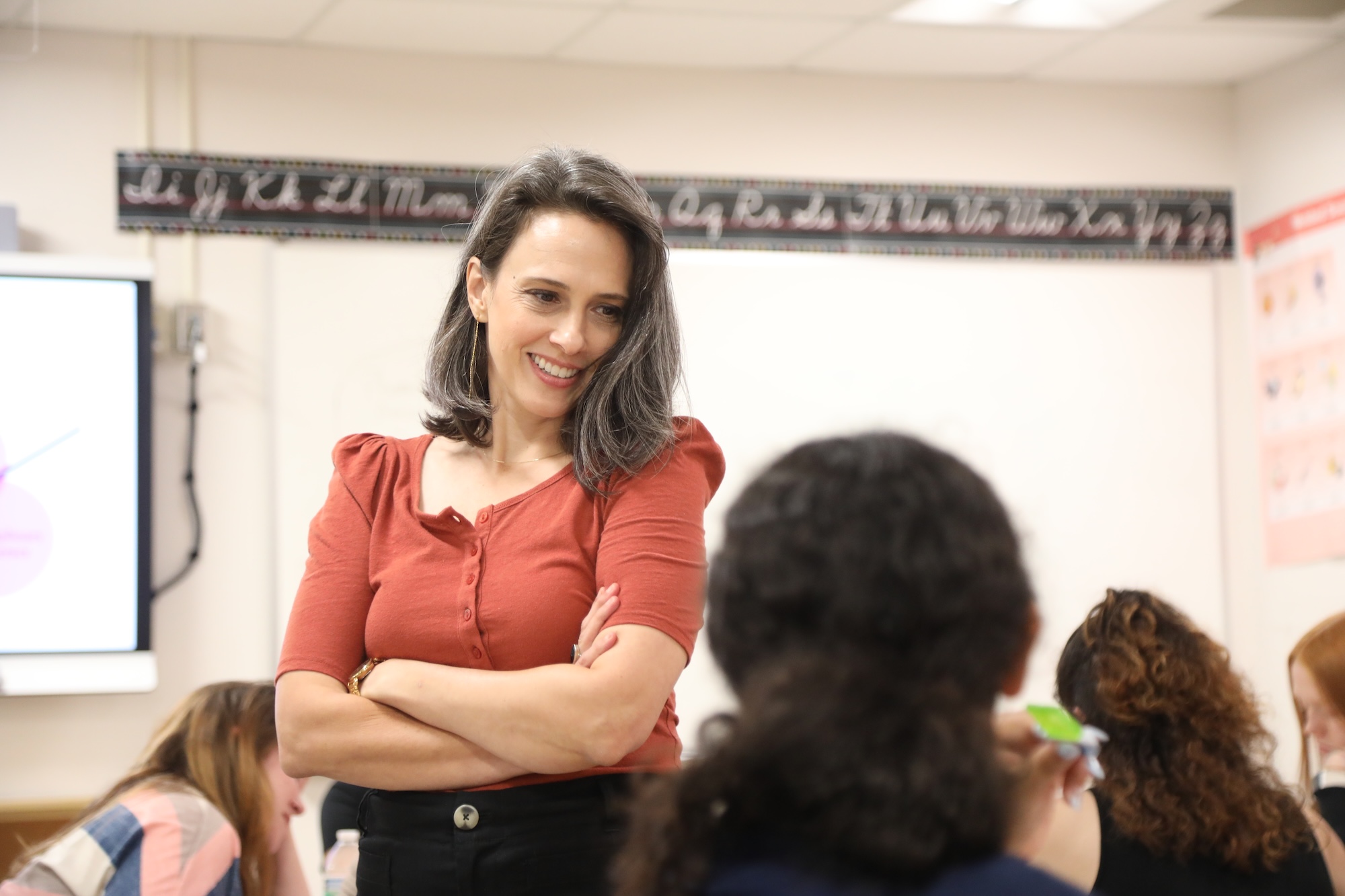 Teacher speaking to students
