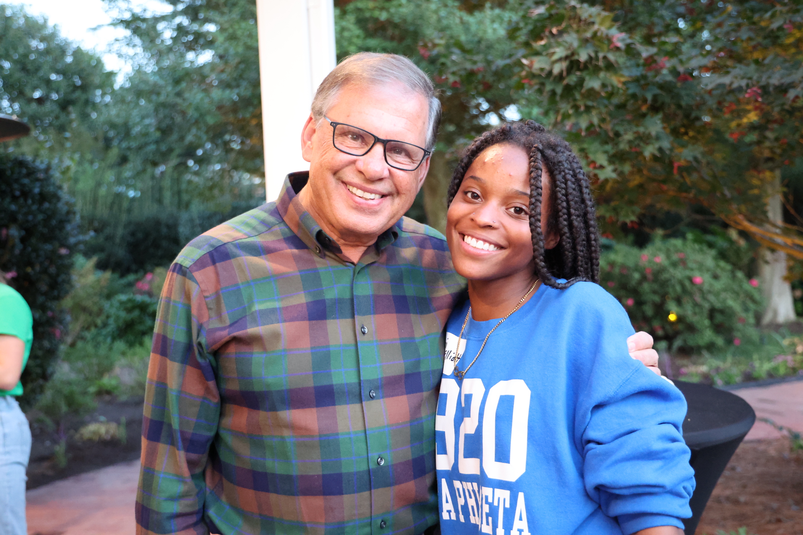 Armani Jones-Elliott with Chancellor Robin Gary Cummings during a UNCP campus event