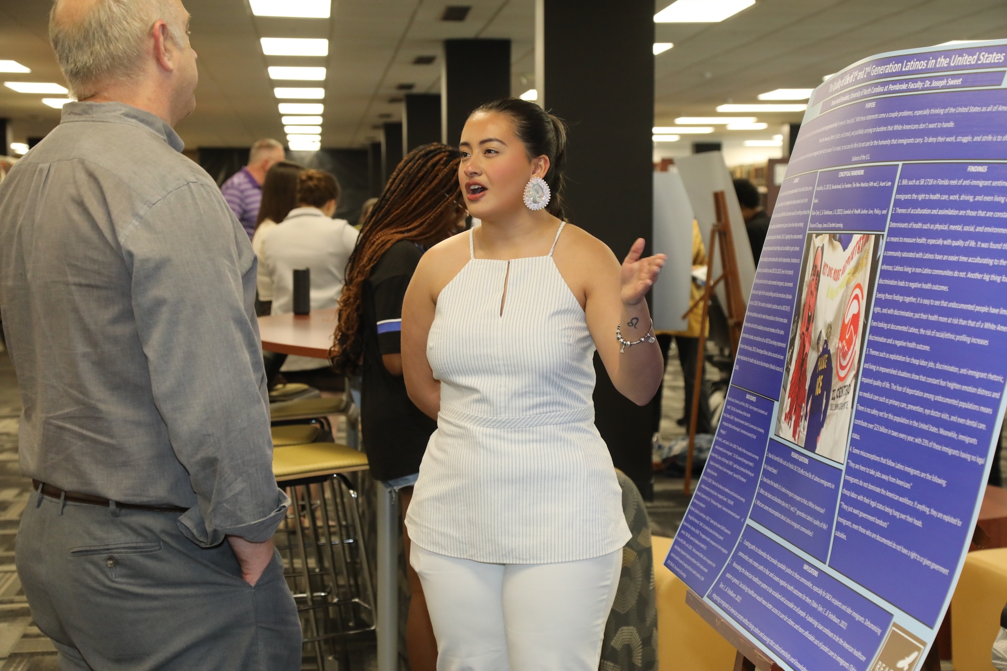 UNCP student at a REACH symposium