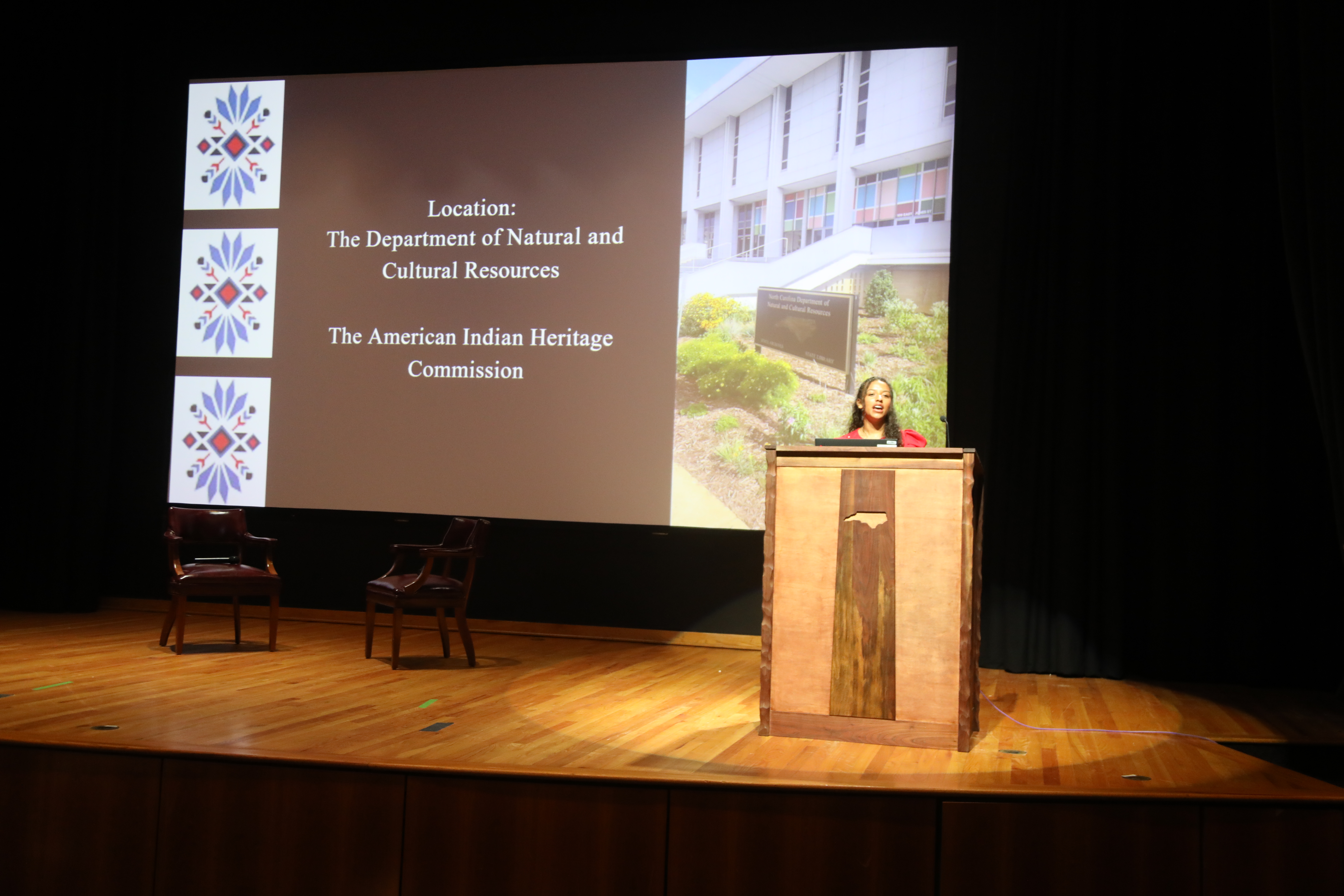 female student at podium
