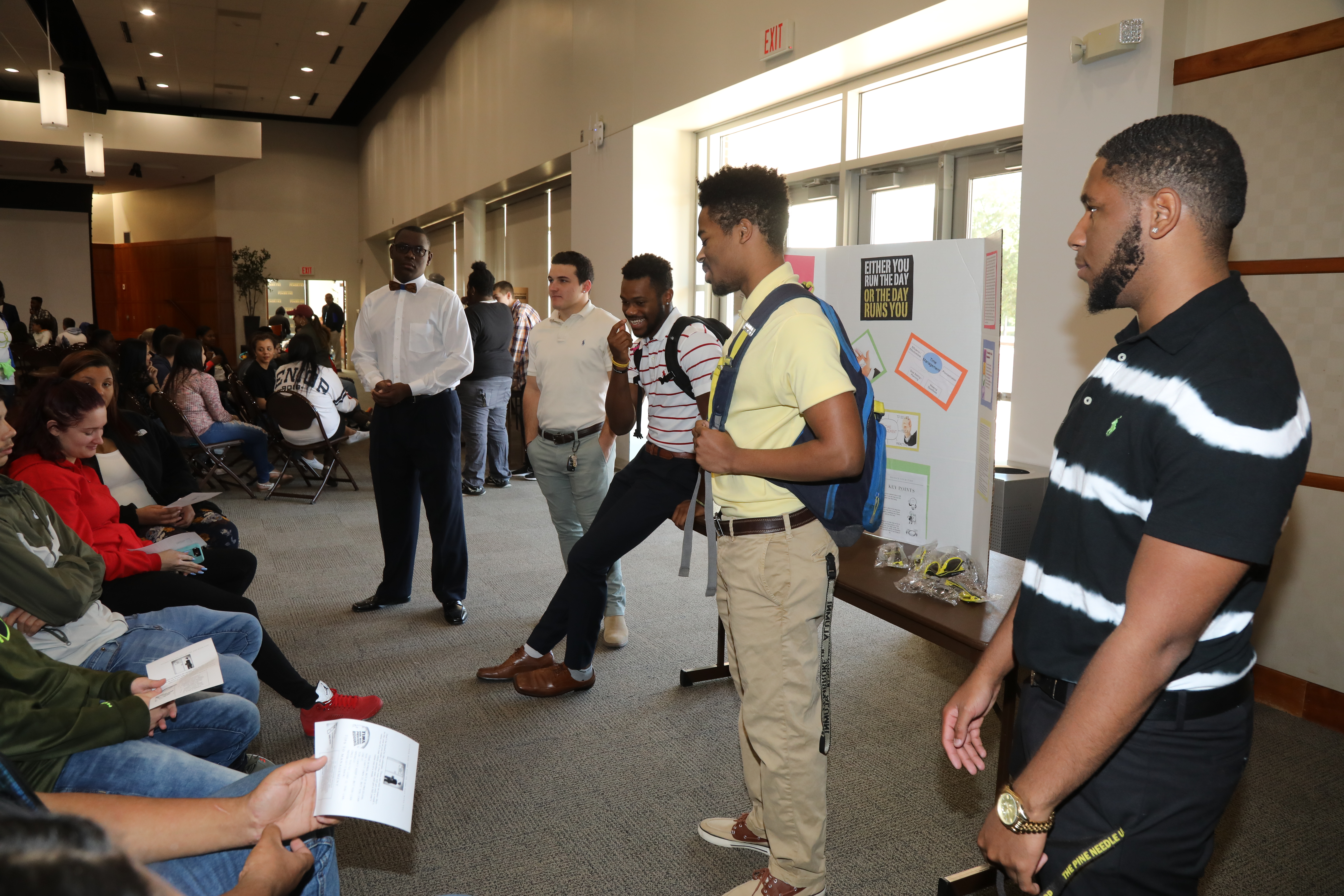 UNC Pembroke students providing guidance to high school students on college readiness during a service learning project.