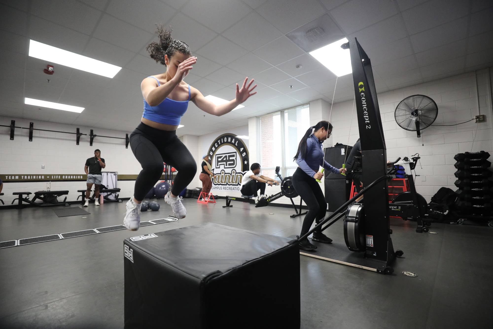 UNCP student doing exercises by jumping on a box