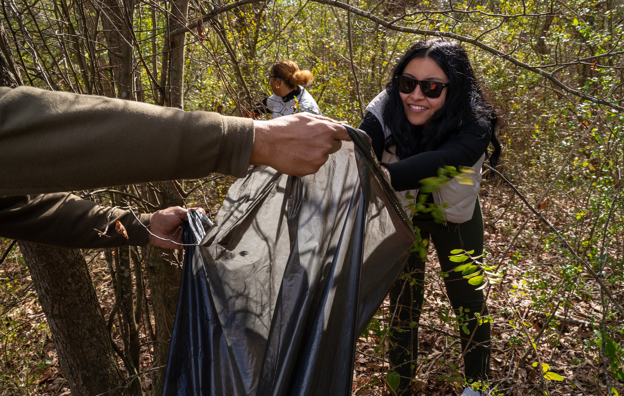 UNCP students cleaning up the woods
