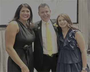 Brad Allen, with his wife, Twilla, and their daughter, Abigail