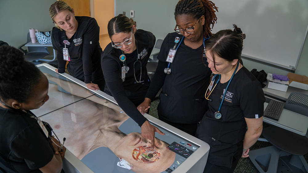 Students in the McKenzie-Elliott School of Nursing at benefit from a high-tech virtual anatomage table