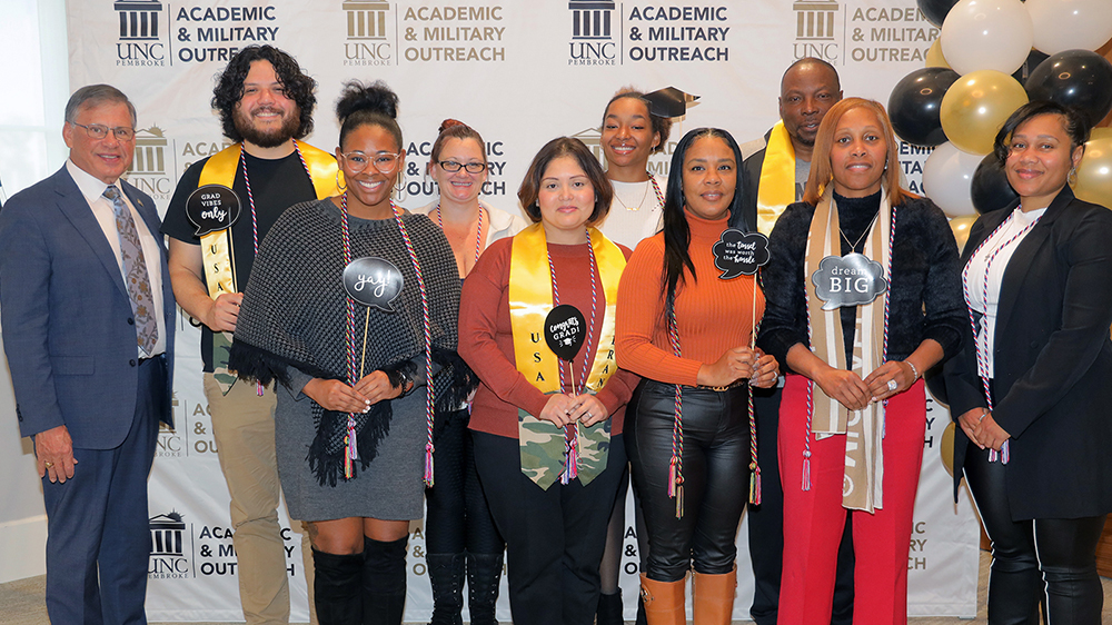Graduating military-affiliated students gathered on the UNCP campus to receive their honor cord