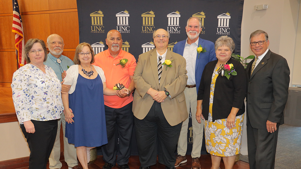 (left to right) Taylor Fields, Everette Strickland, Mary Parker, Mickey Hunt, Dr. Gary Mauk, John Haskins, Felicia Scott and Chancellor Robin Gary Cummings