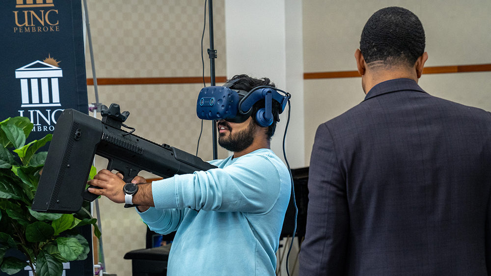 UNCP junior Harry Lamichhane tests a DS Drone Defender during the U.S. Department of State career showcase on February 26
