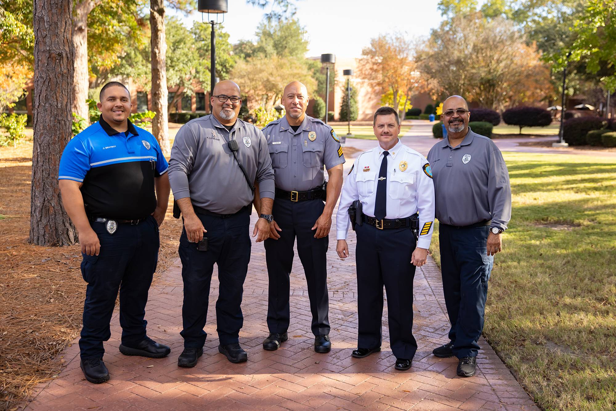 badge on the sleeve of a UNCP Campus Police and Public Safety officer