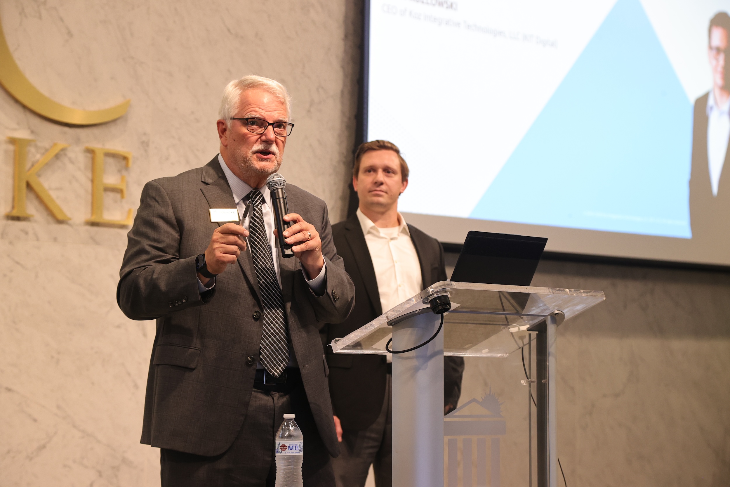 Dr. Stewart Thomas, dean of the Thomas College of Business and Economics, introduces Kozlowski