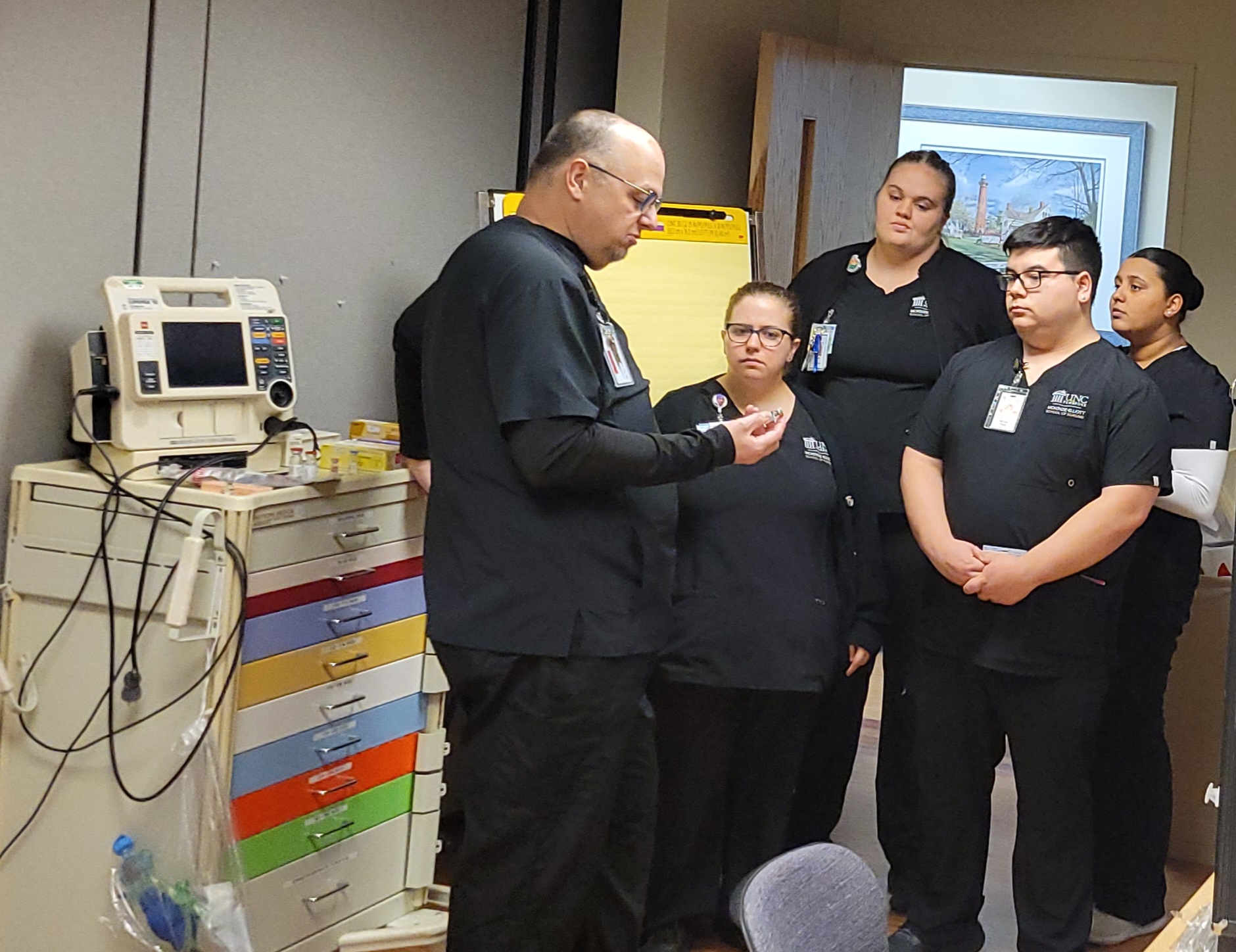 Chris Barnes, assistant clinical professor at UNCP provides ACLS training to UNCP students.