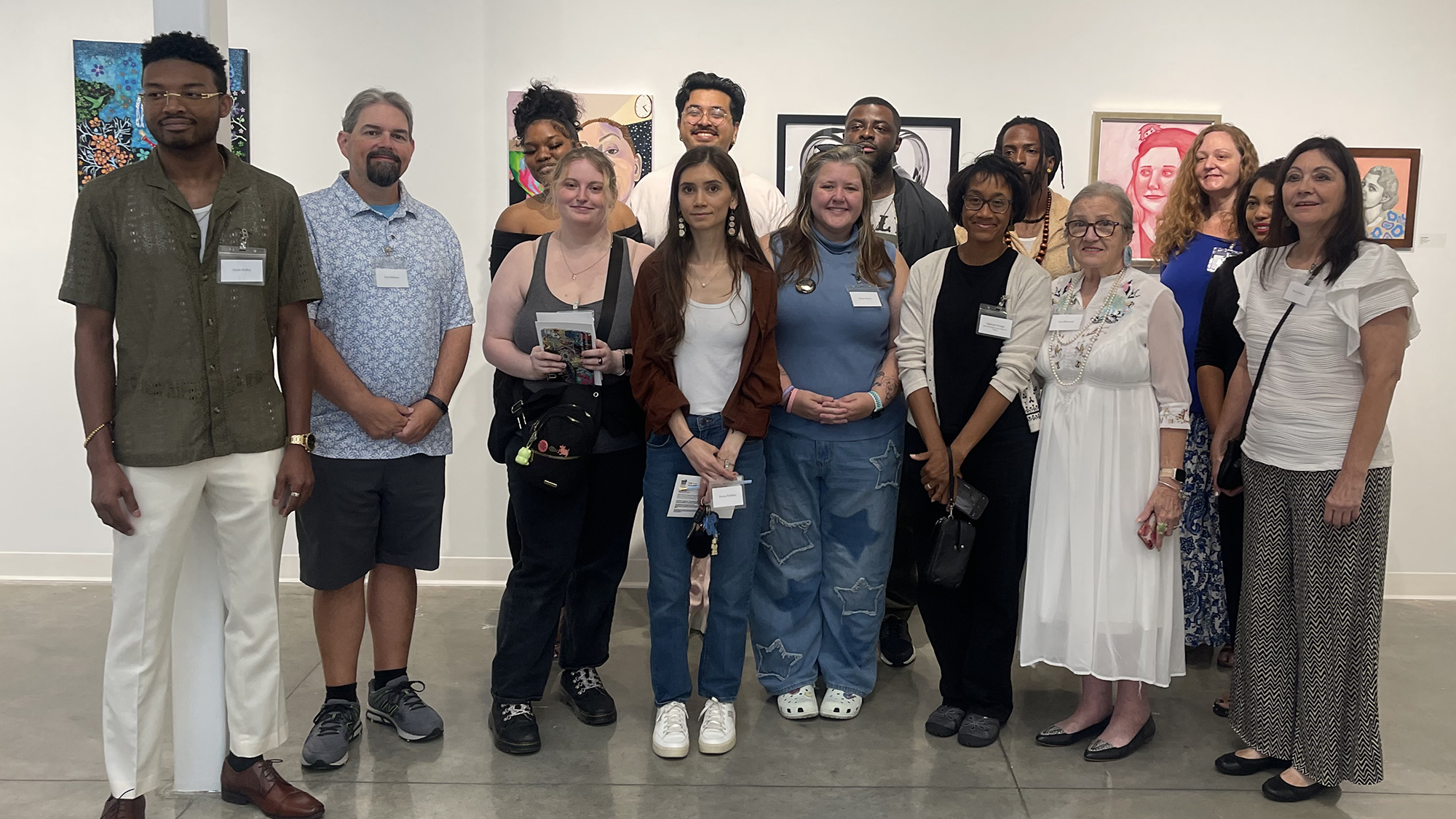 Artists and jurors pose for group photo