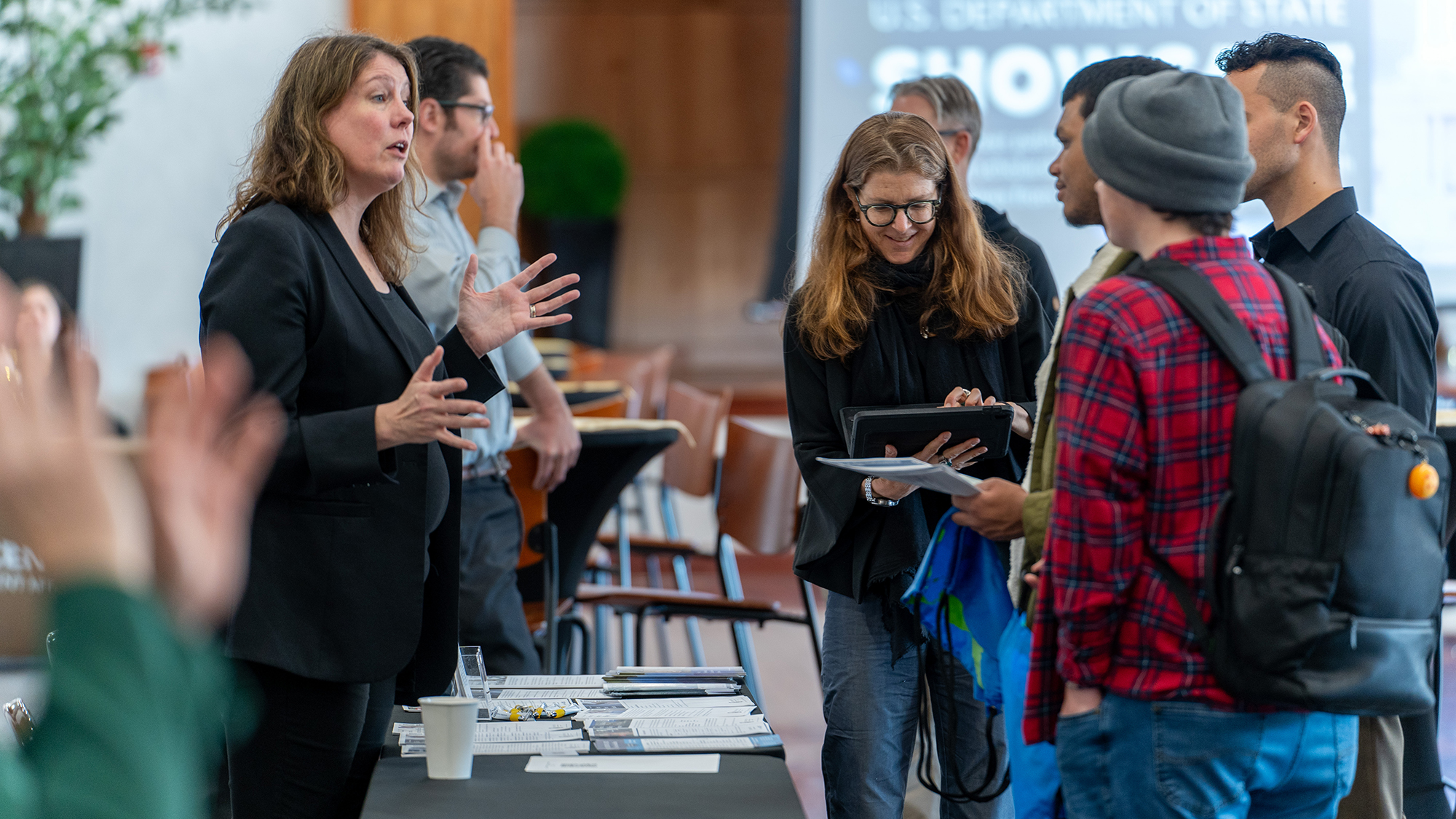 US Department of State agents engage with students during a career showcase