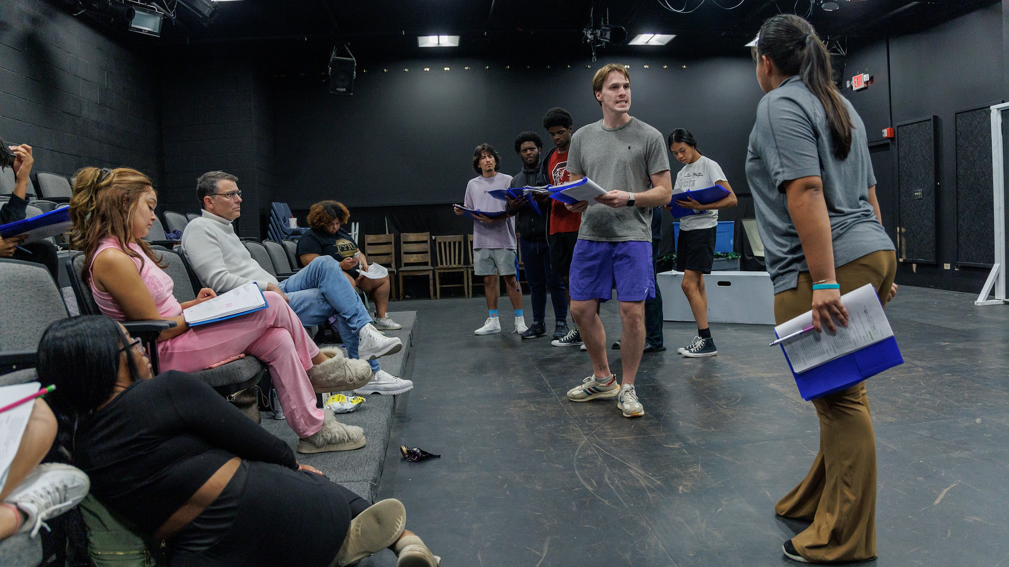 Students practicing lines for a musical