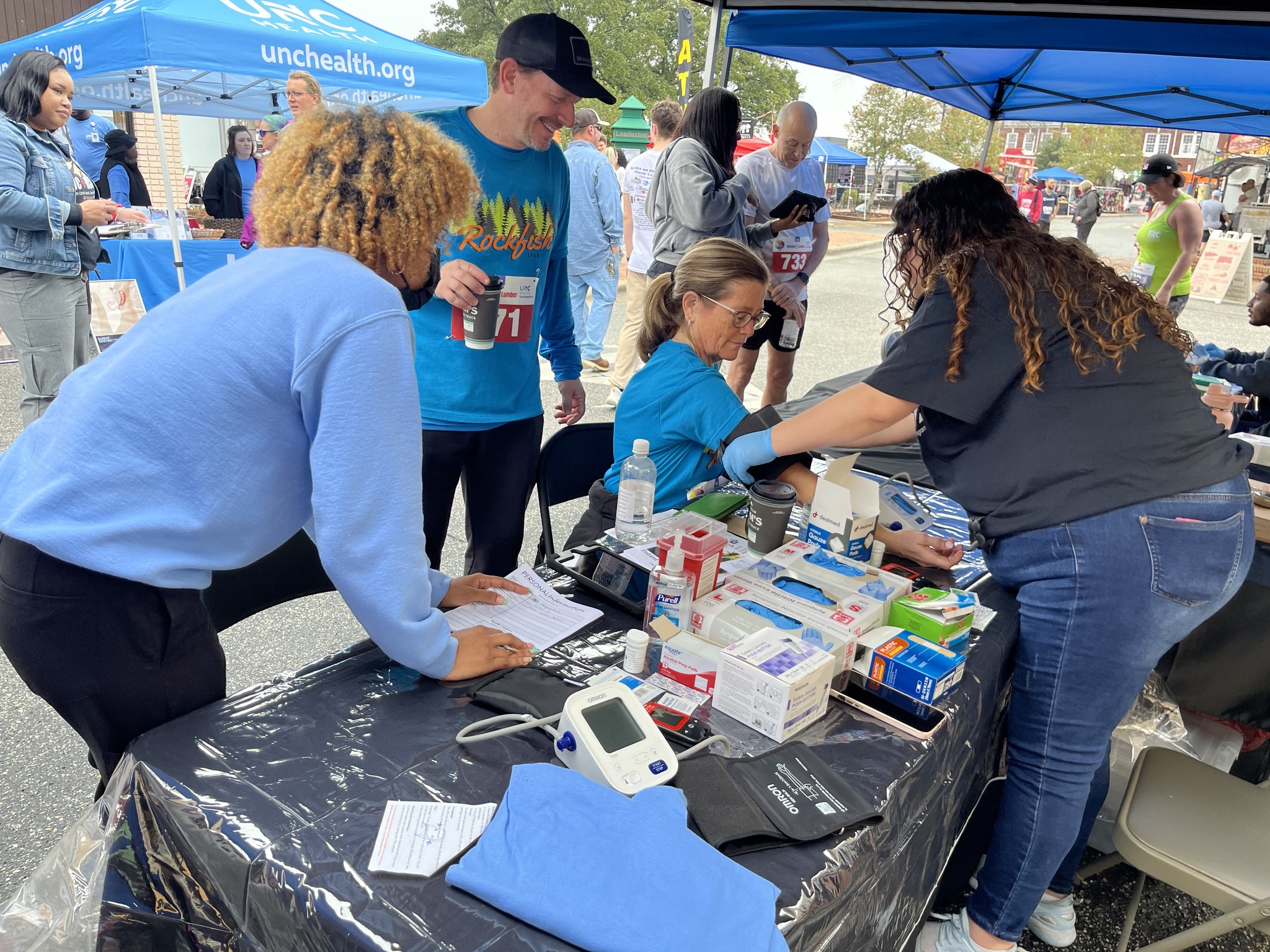 Diverse group of adults participating in a healthfair in a community setting in Lumberton, NC