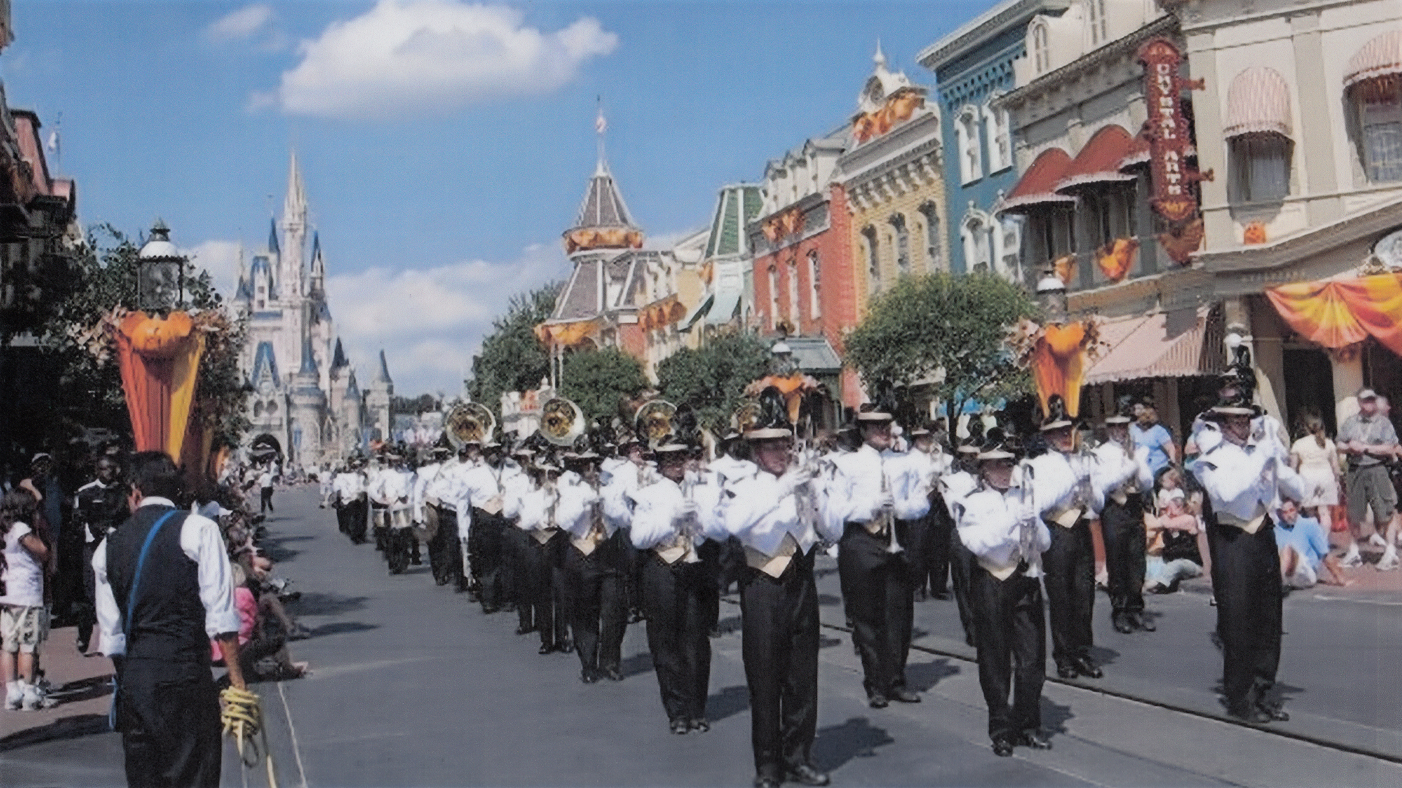 band marching along street while playing