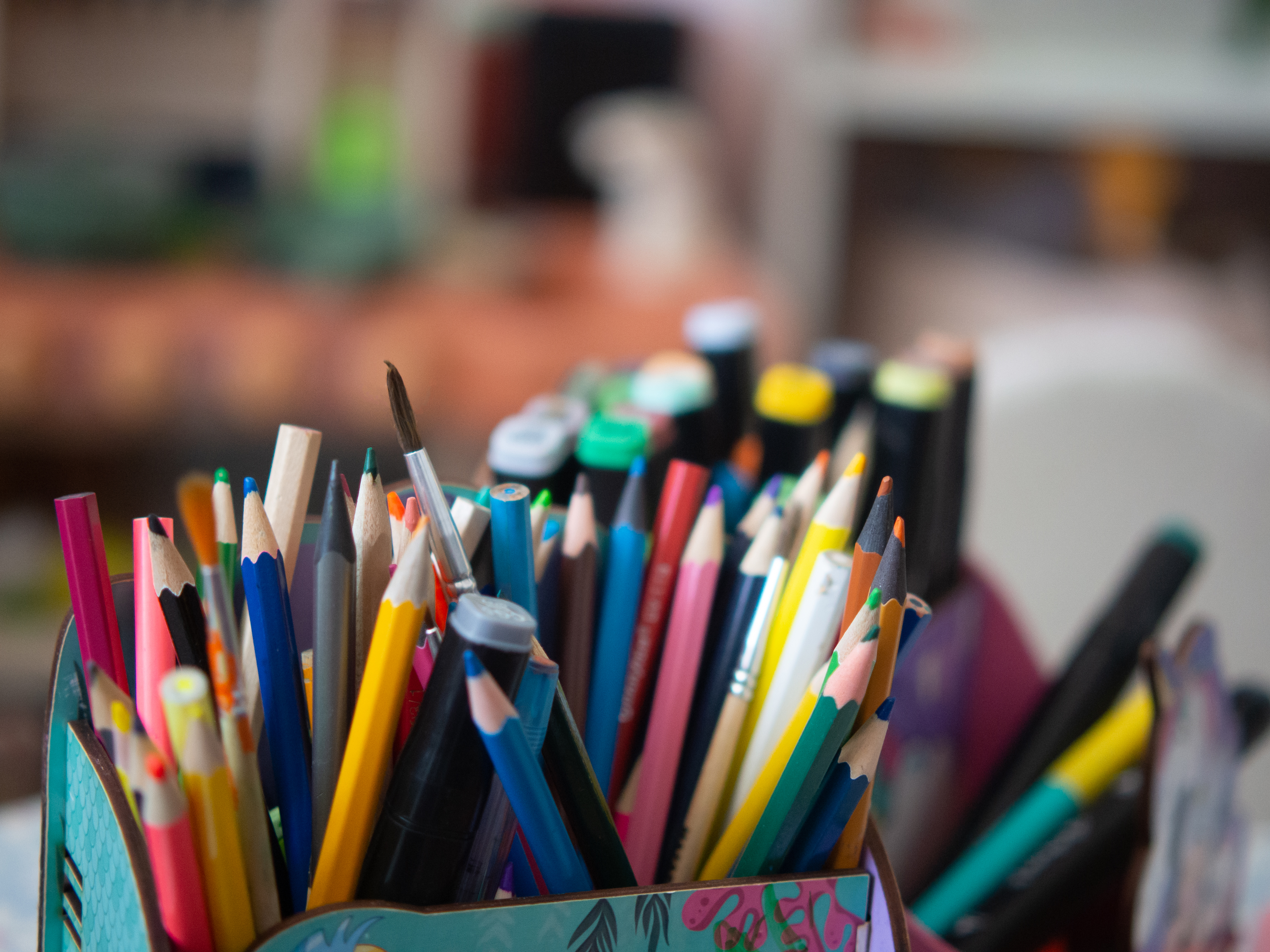 Box of pencils and markers