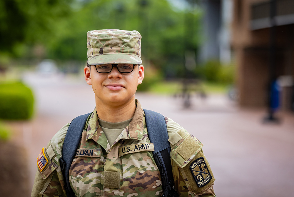 Military student on UNC Pembroke campus smiling