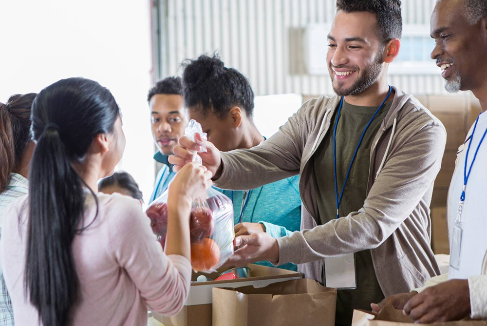 someone handing out food