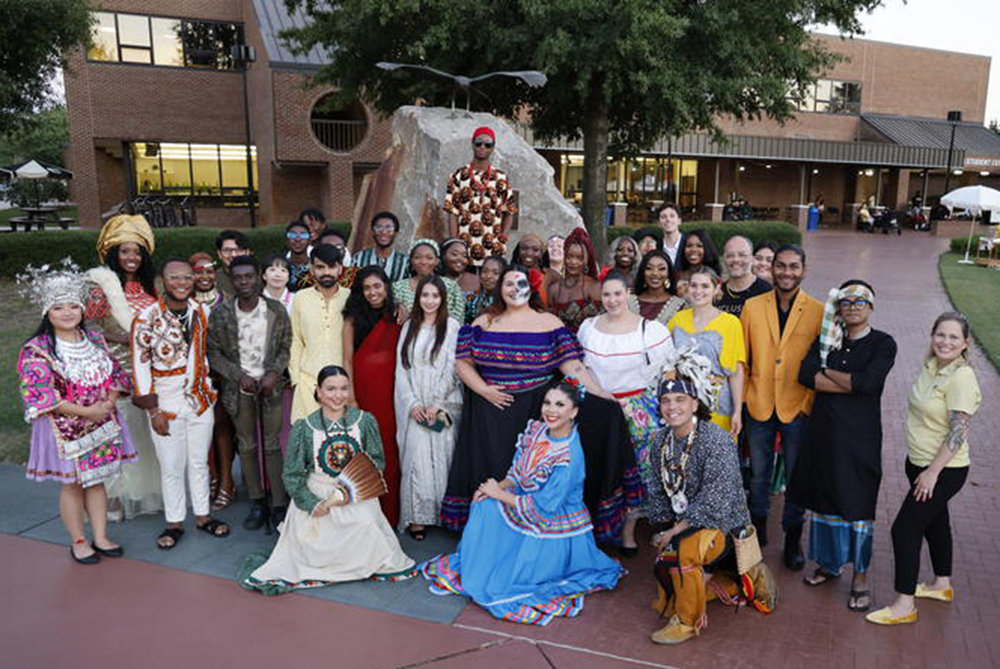 UNCP students particiapting in a cultural fashion show