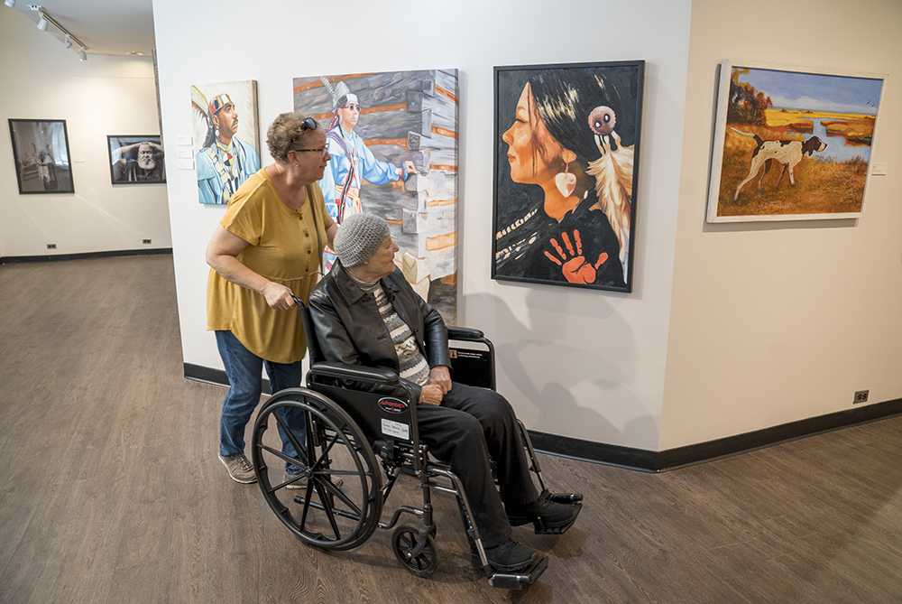 People on a tour of the museum at UNCP
