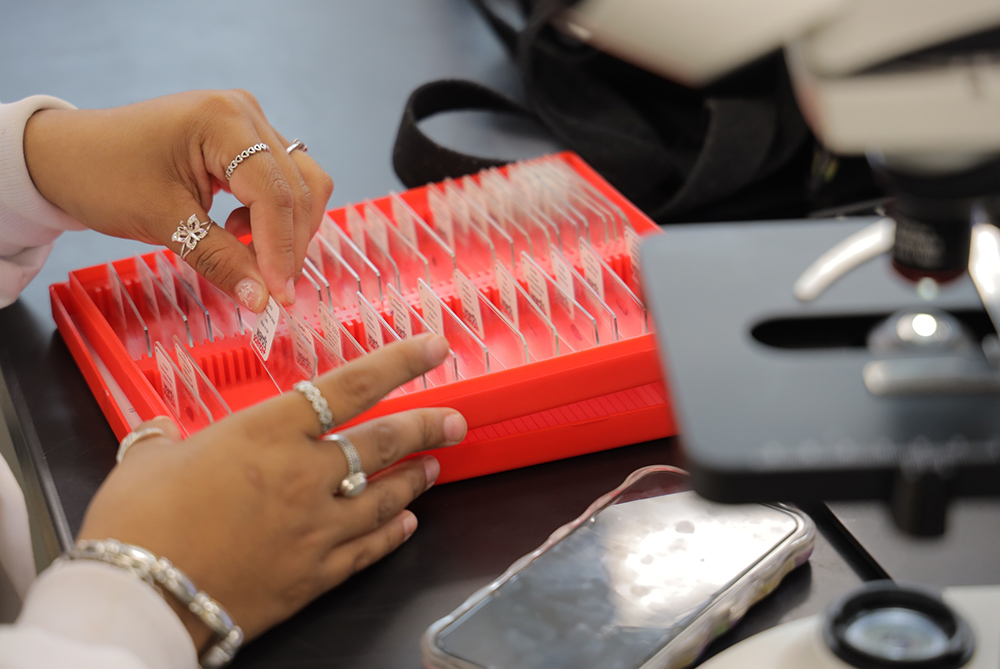 UNCP student with Biology Samples