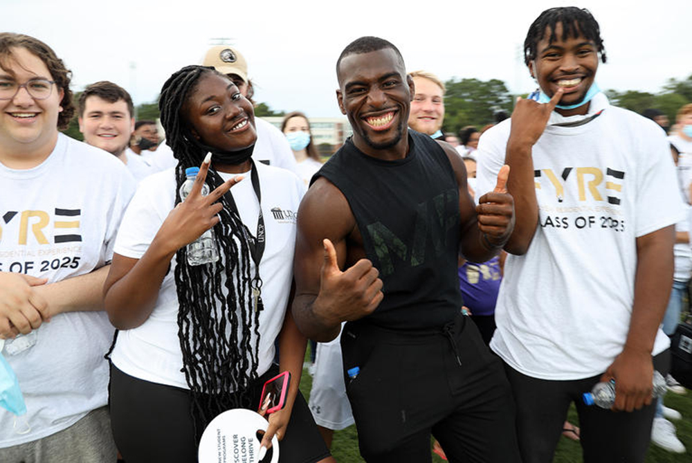 Students from UNCP's class of 2025 posing for a picture