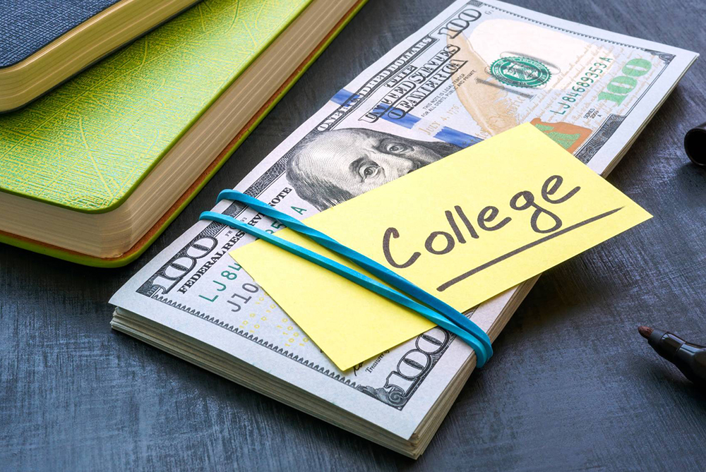 money with a sticky note that says College