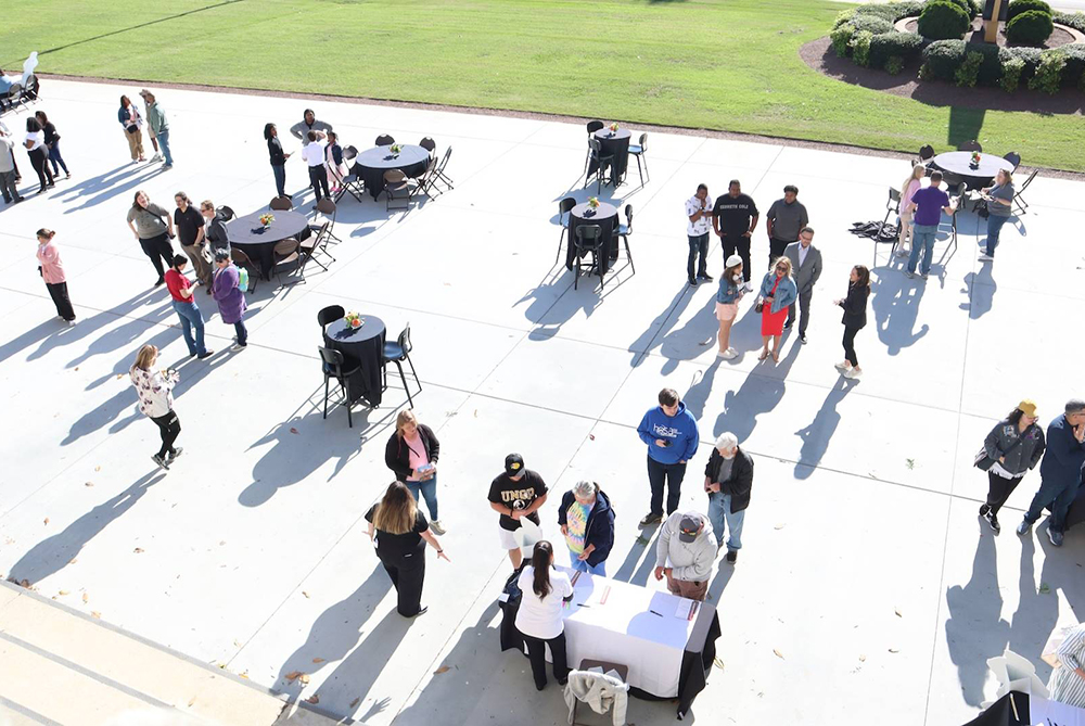 open house at UNCP people standing outside