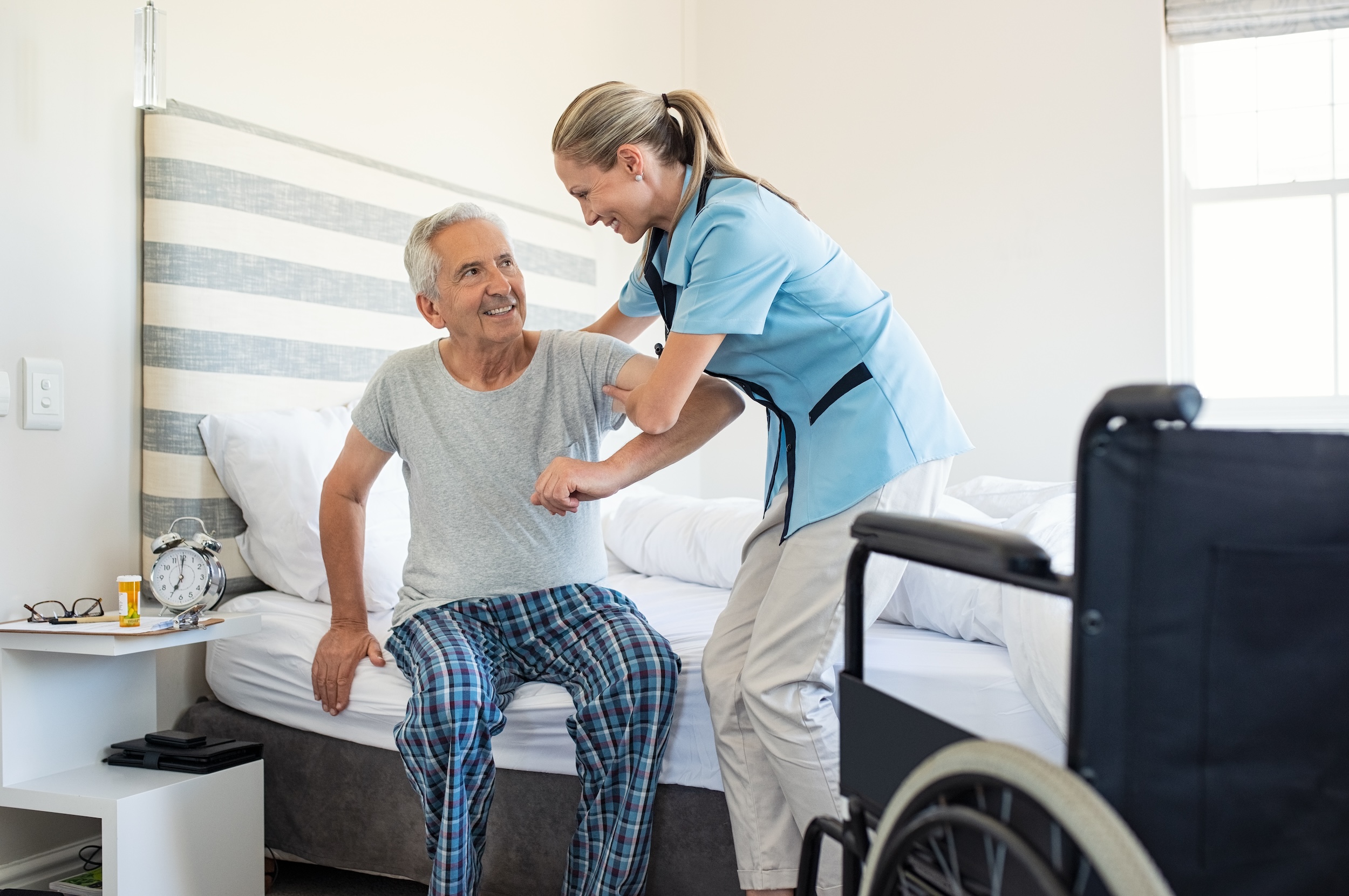 occupational therapist helping client