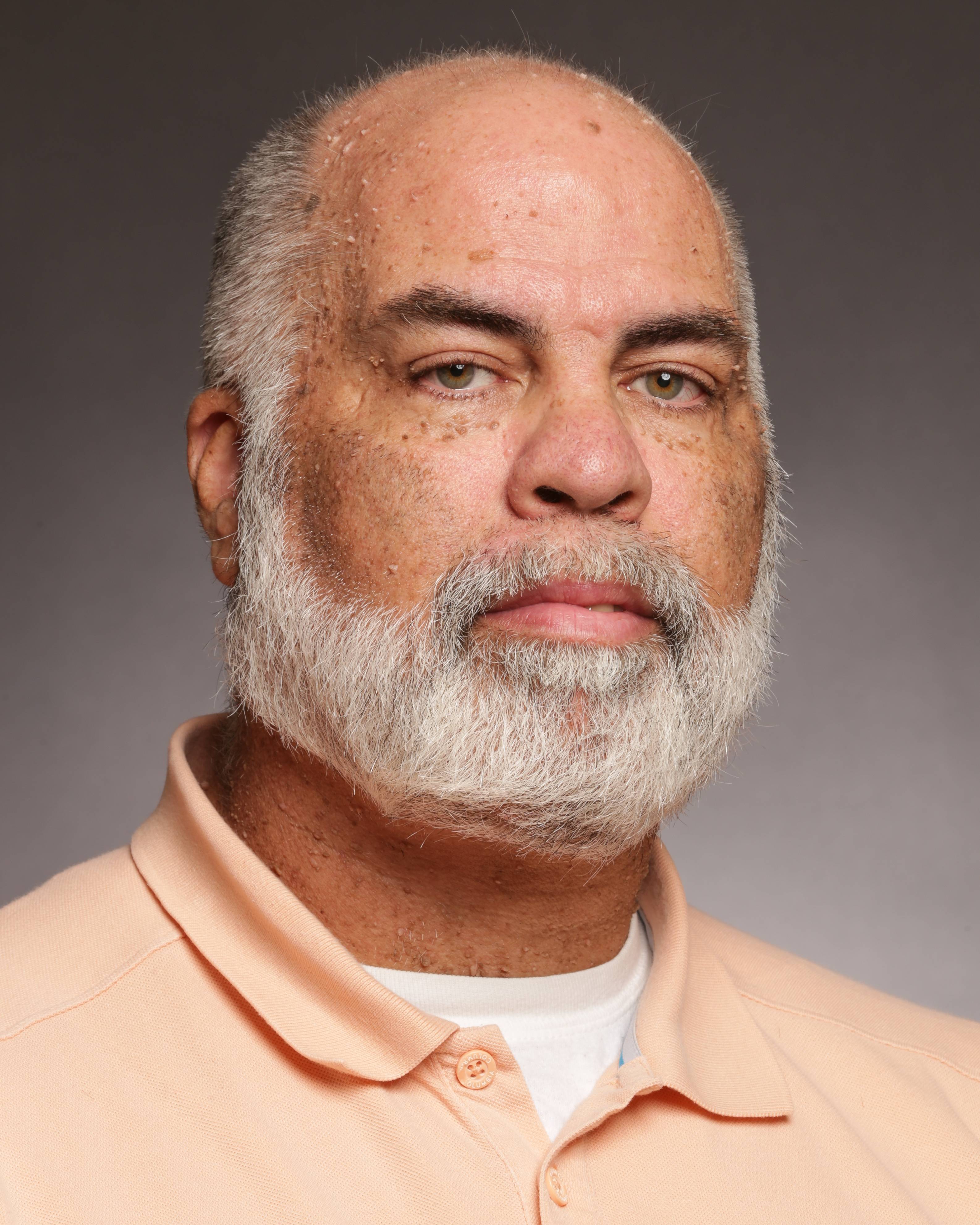 headshot of Ken Brayboy