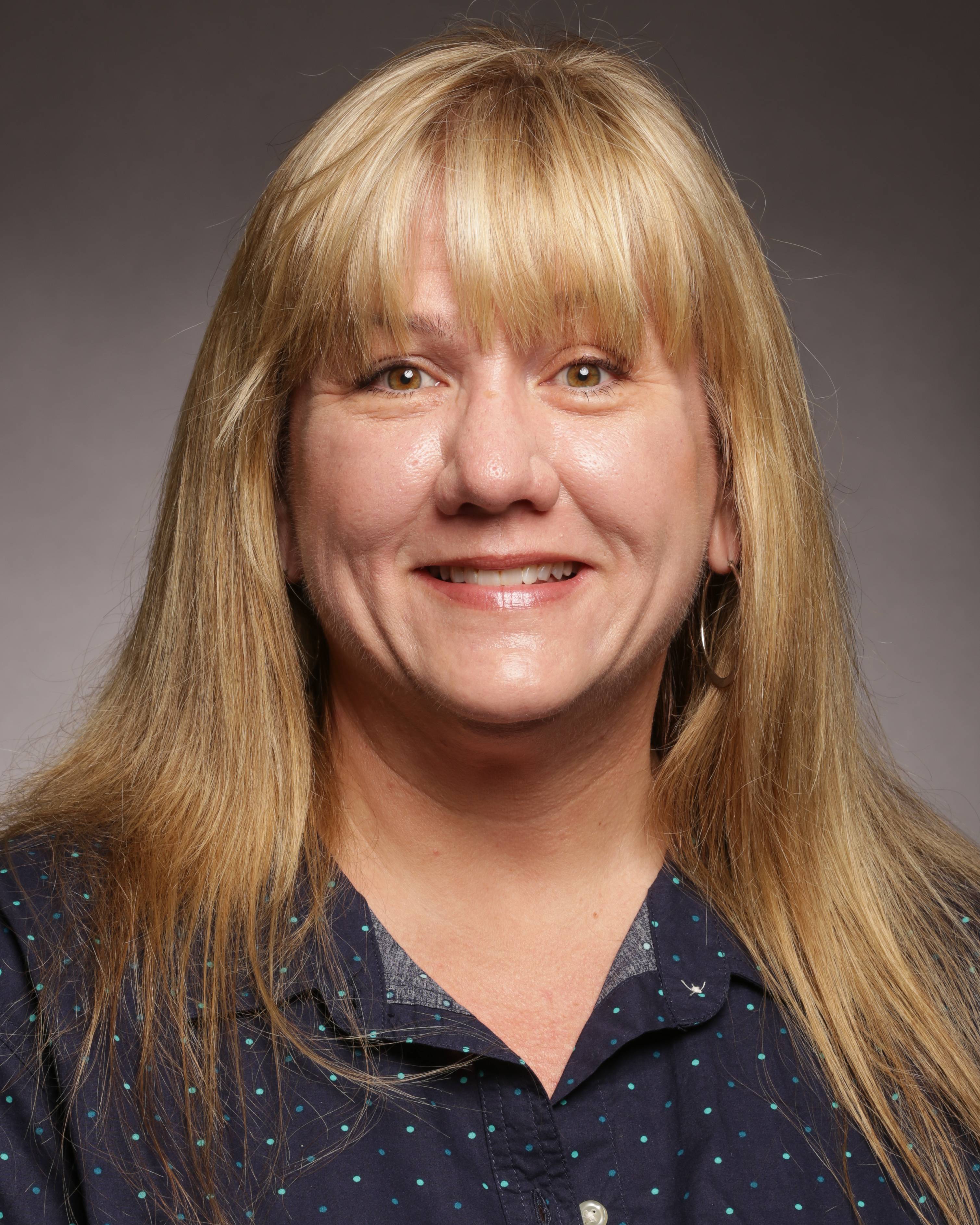 headshot of Kelly Charlton