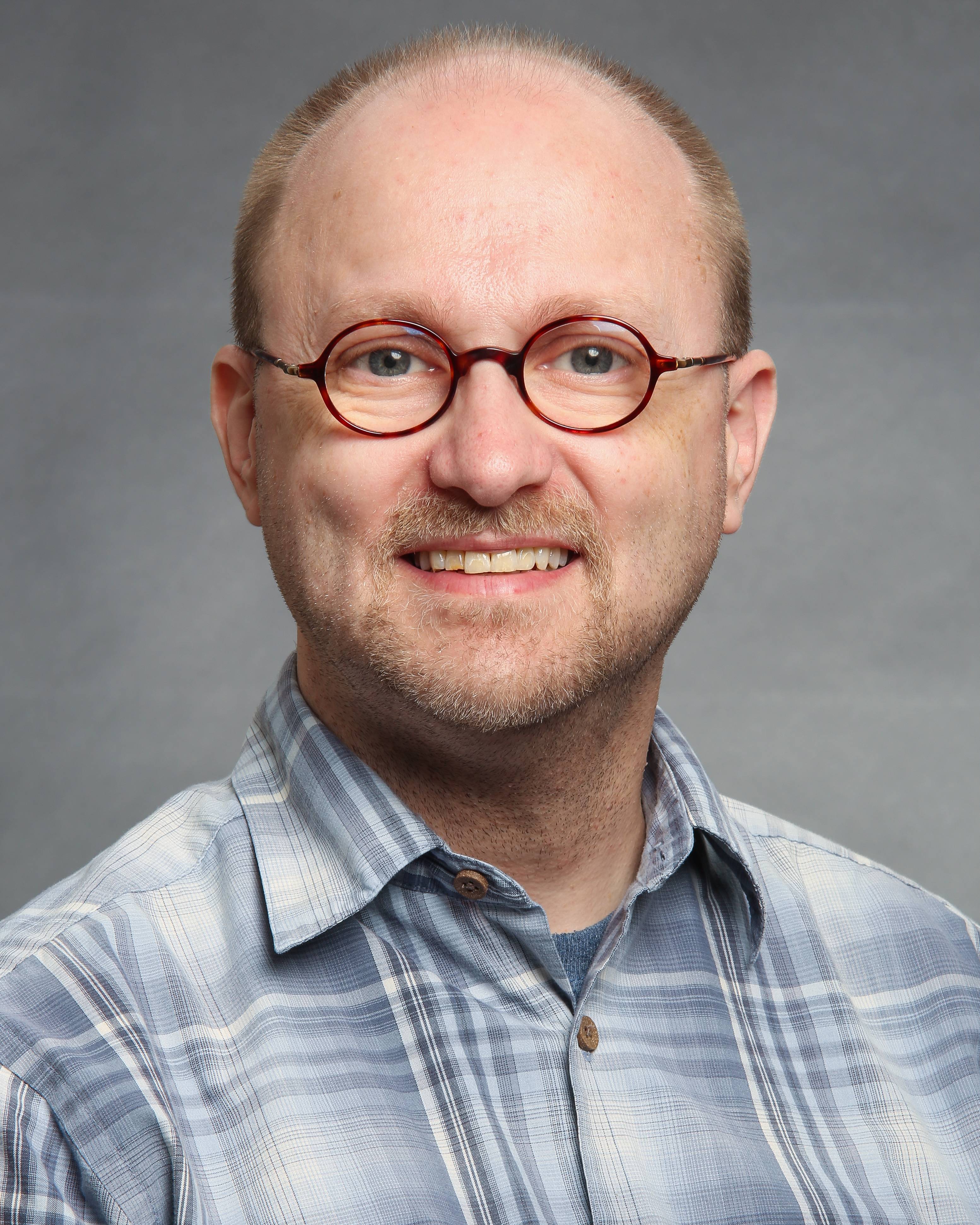 headshot of William Collier