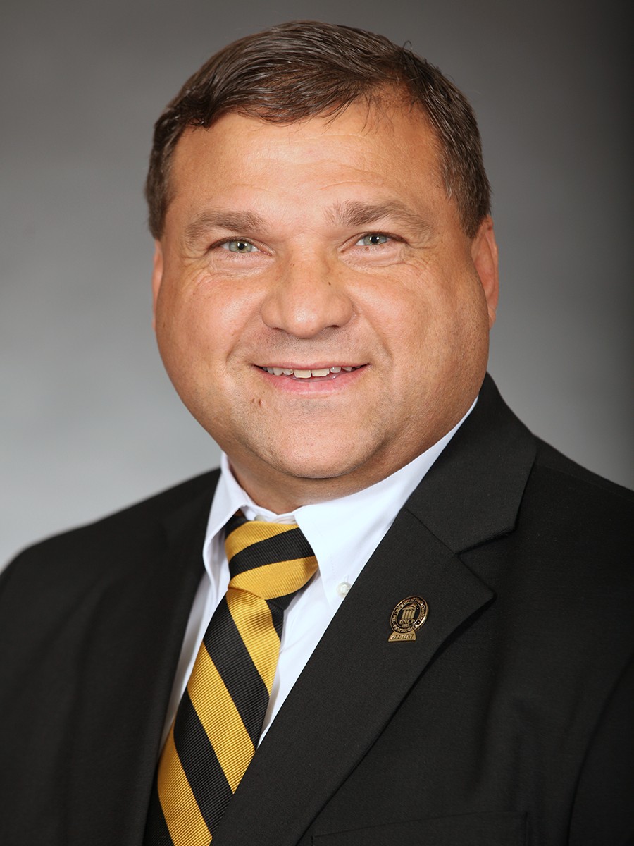 James Smiling, headshot