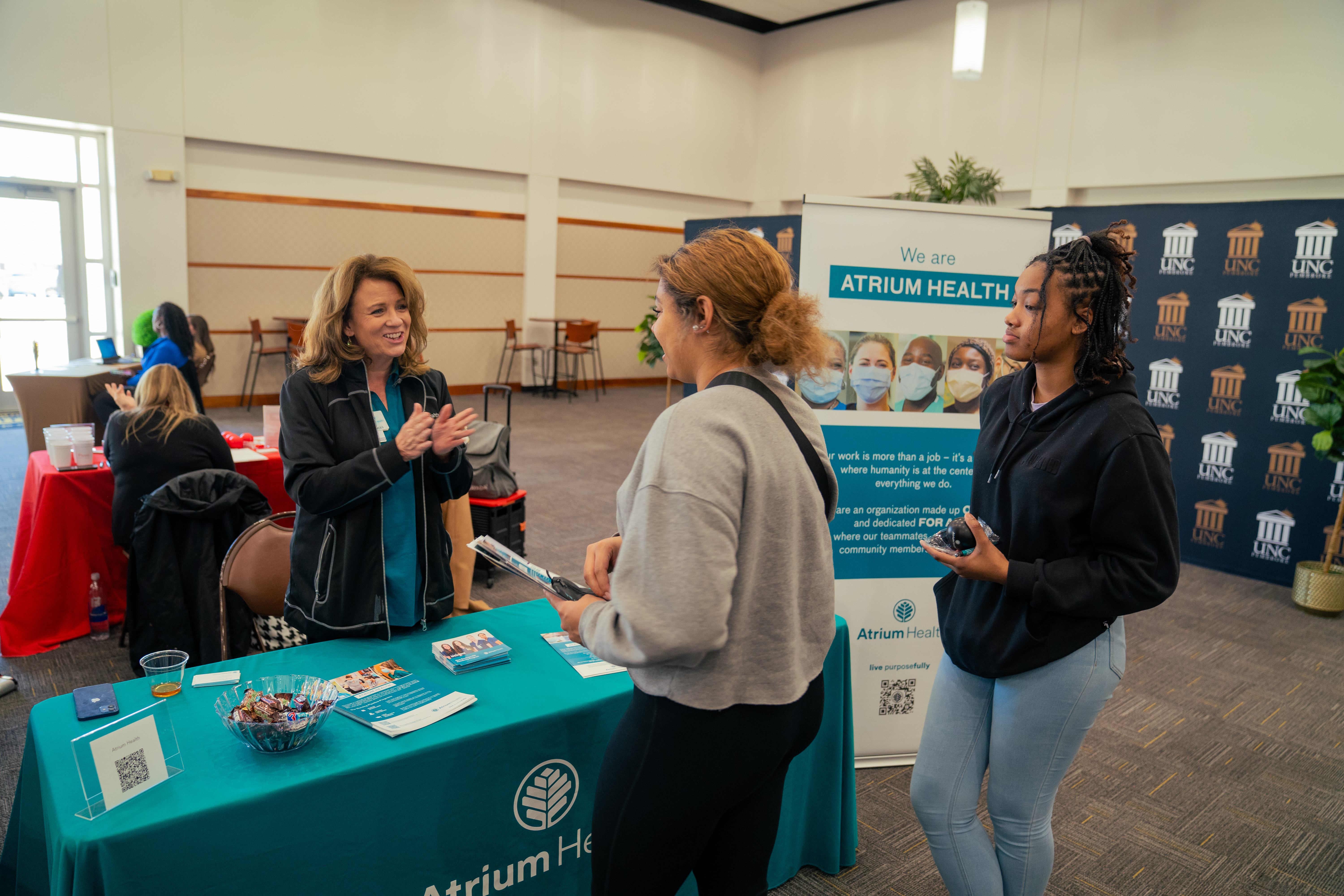 UNCP students engaging with employers at a career fair on the campus of UNC Pembroke.