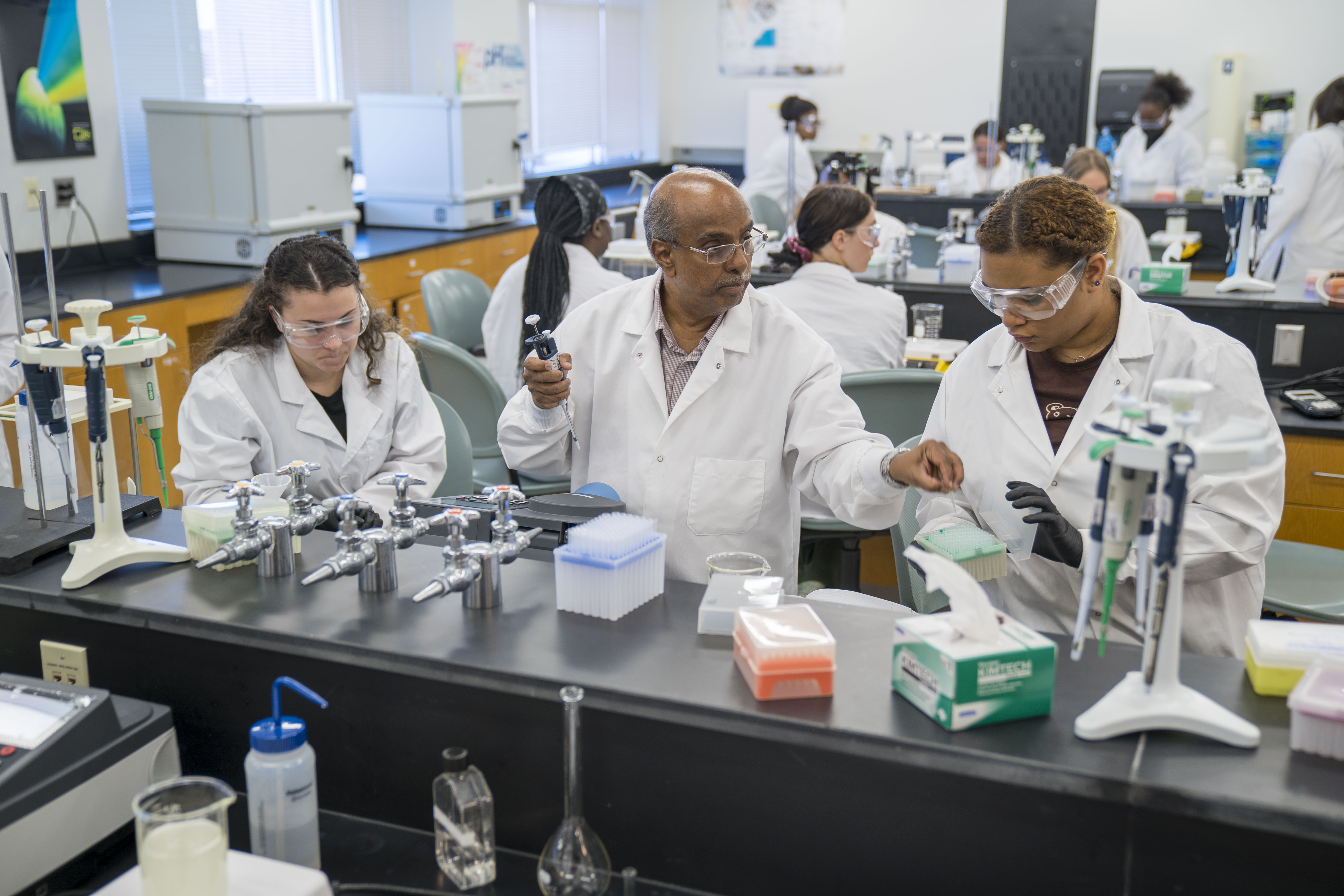 professor teaching students in chemistry class UNC Pembroke