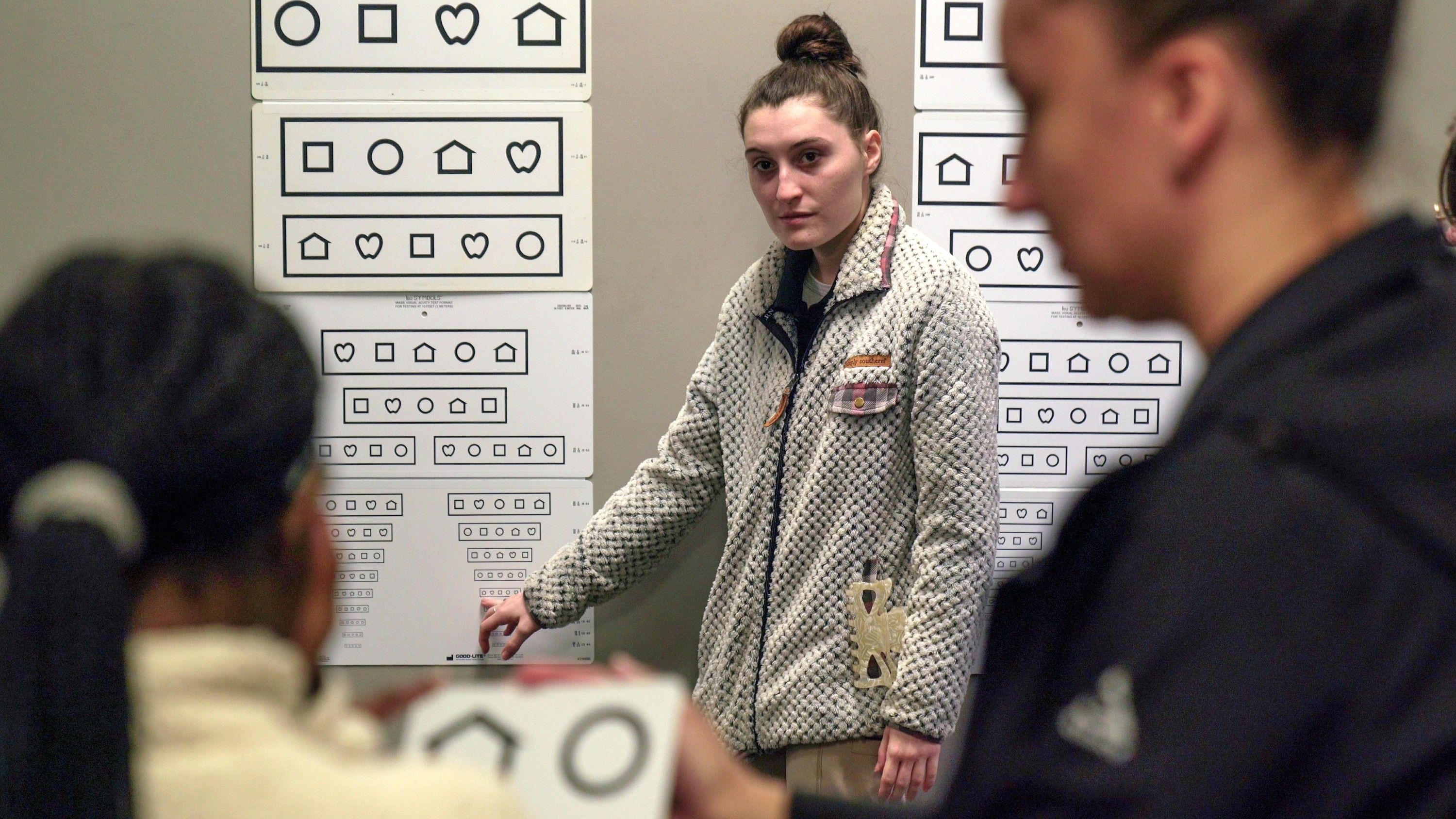 Nursing students provide vision checks during Sports Empowerment Day at UNC Pembroke.