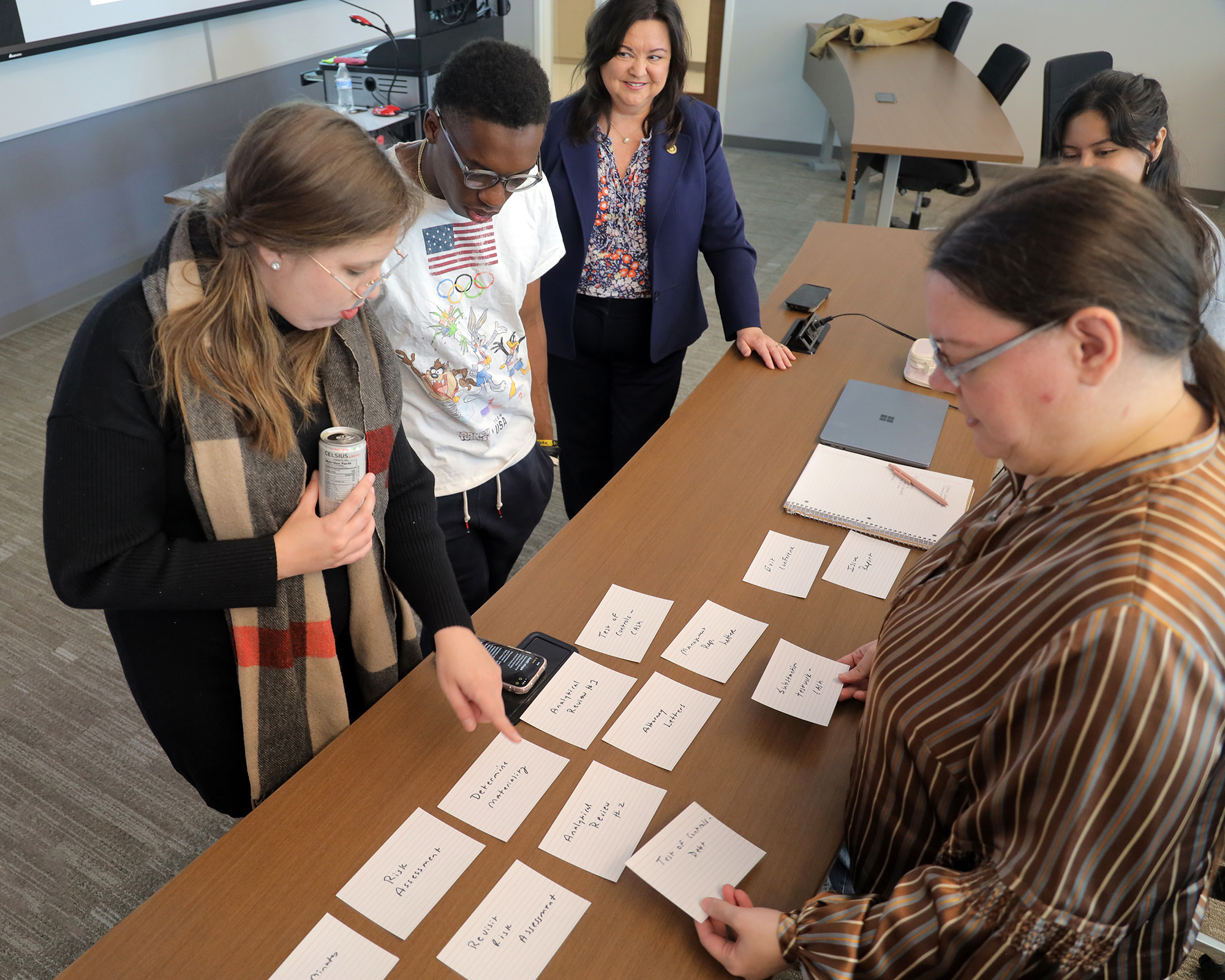 Accounting faculty member working with students at UNC Pembroke