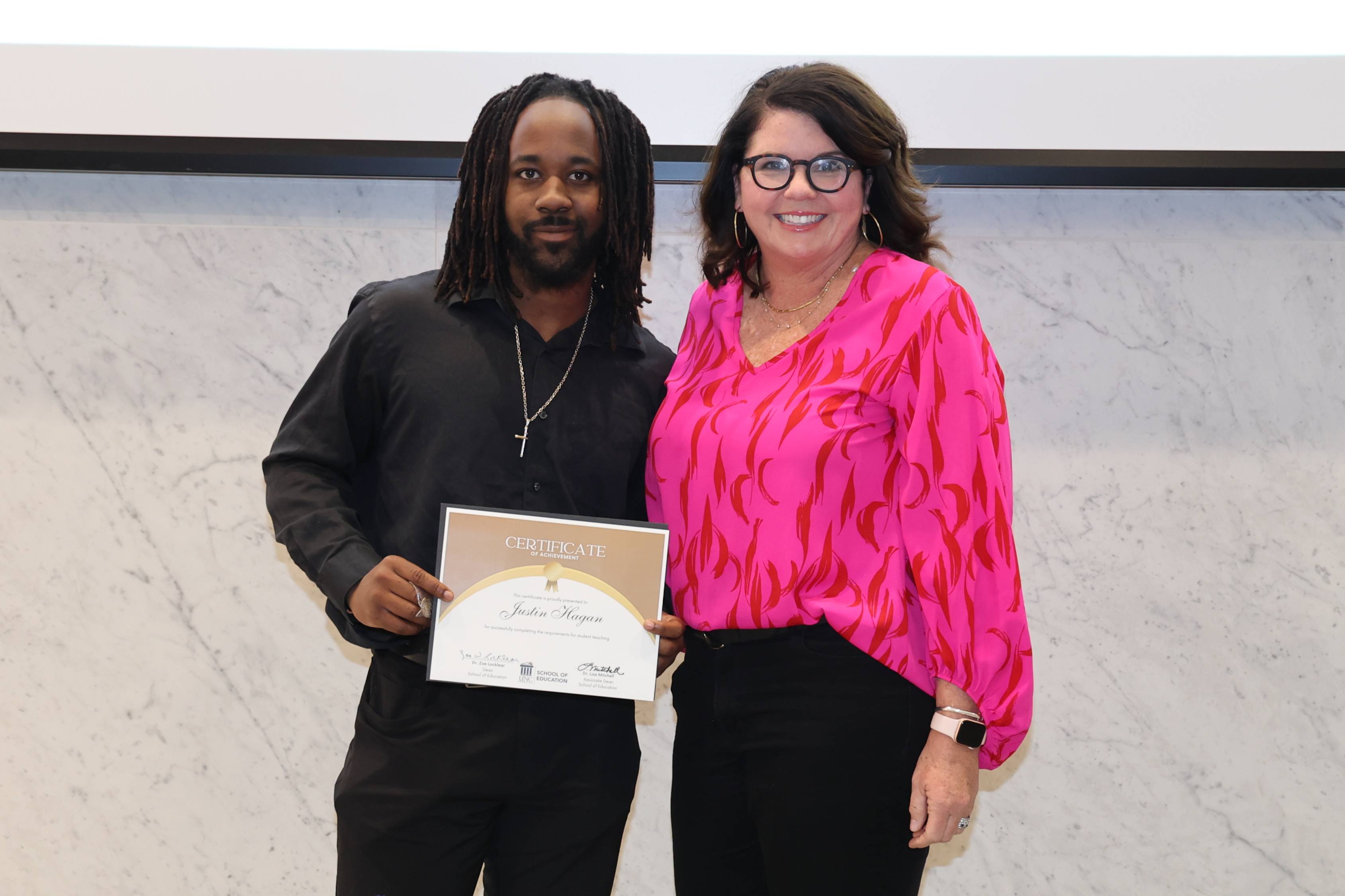 Dr. Granger with a student