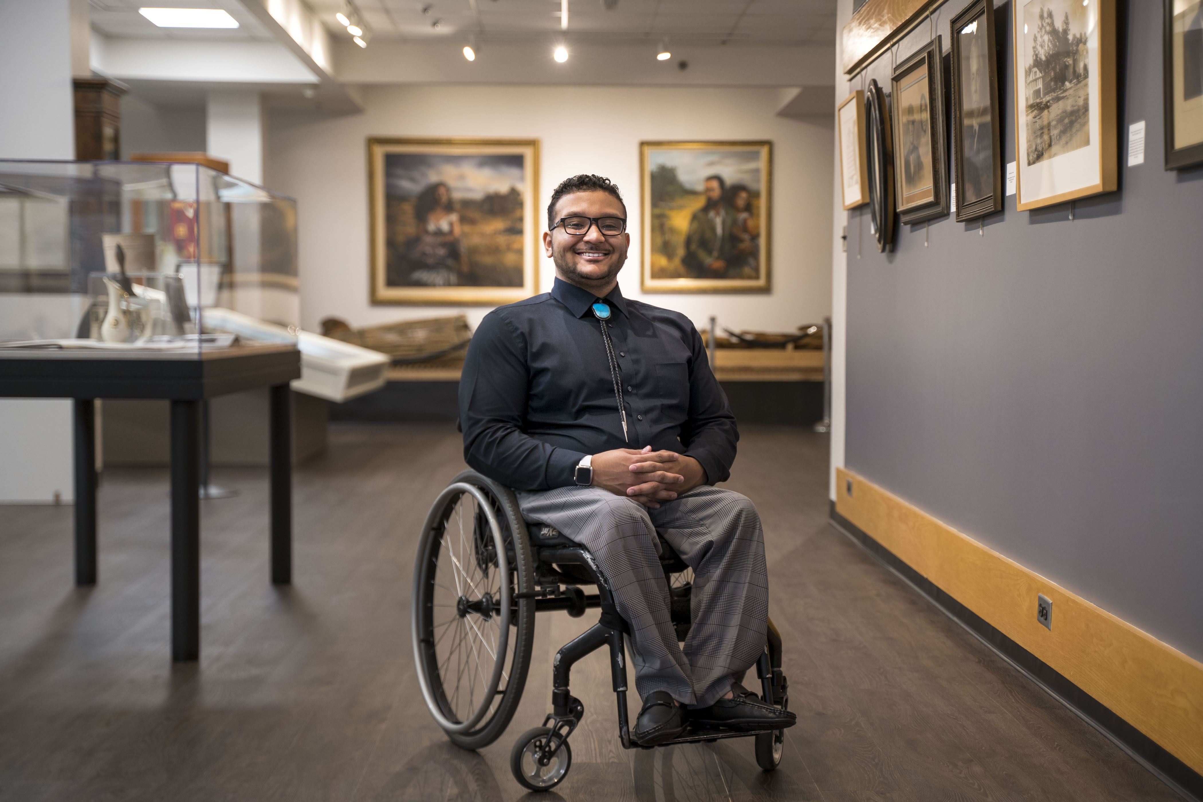 UNCP student Benjamin Clark inside the Museum of the Southeast American Indian