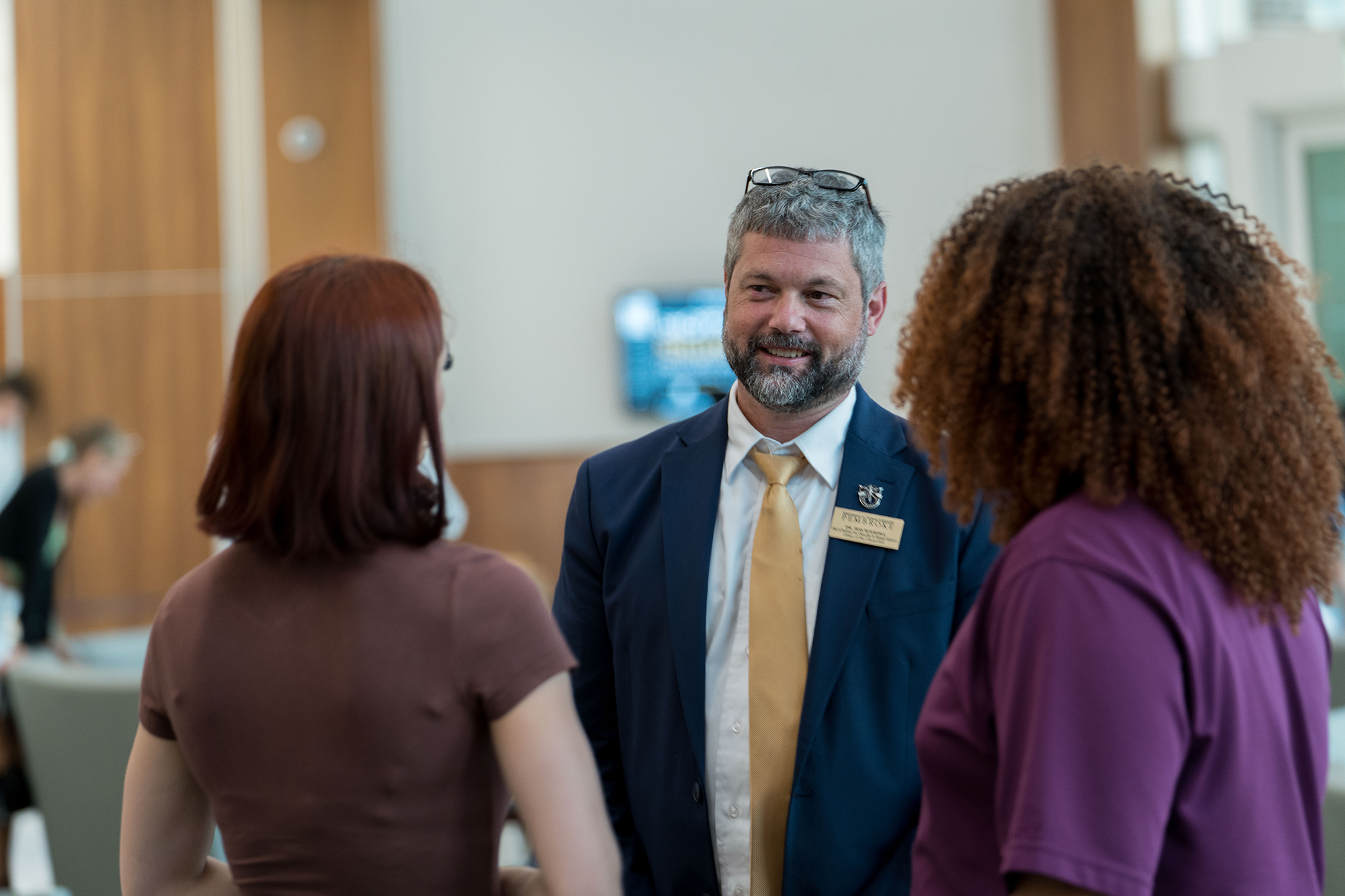 Dr. Jess Boersma speaks with students at UNCP.
